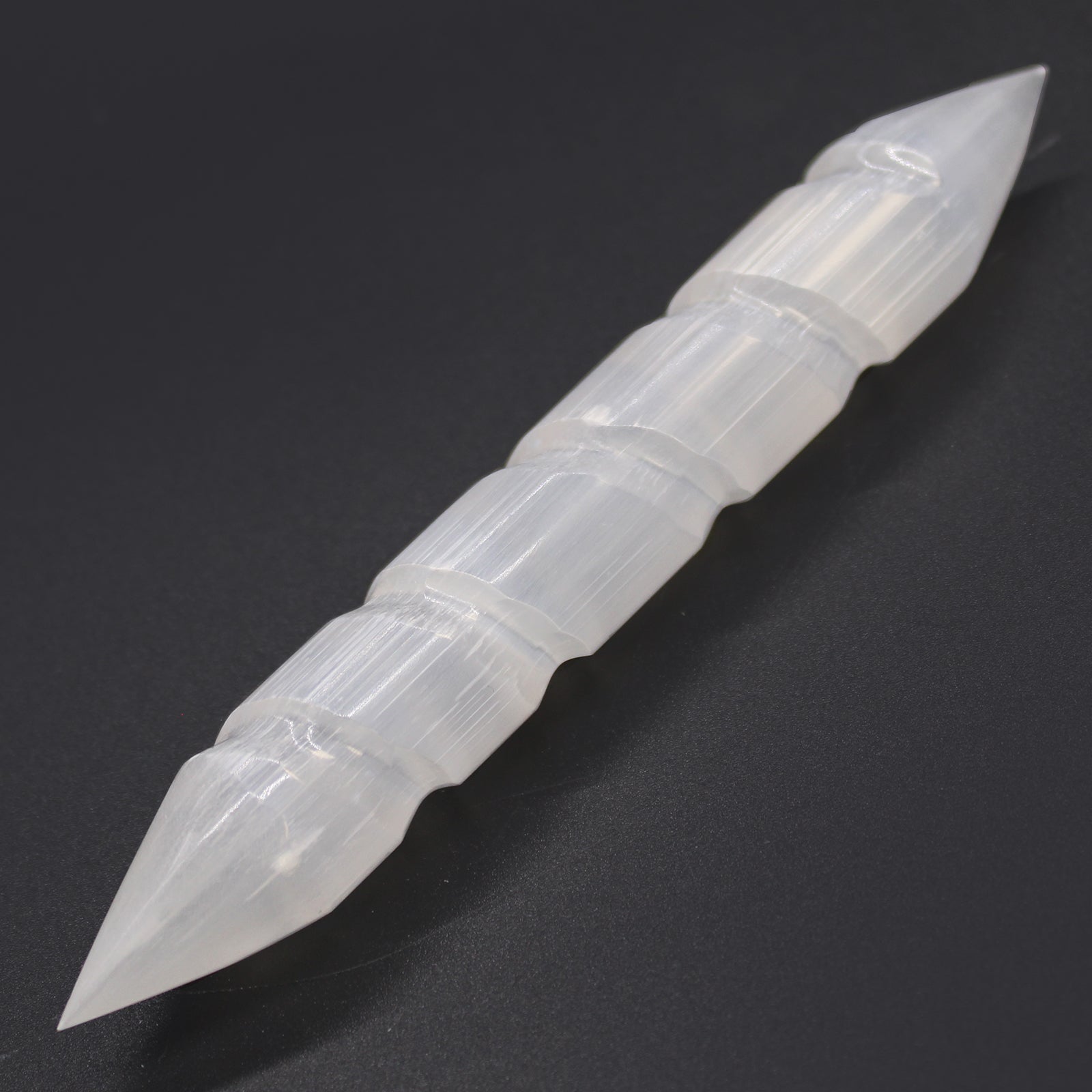 Pointed End Selenite Spiral Healing Wand product packaging on clean background from Quintessential Holistic Health Ltd