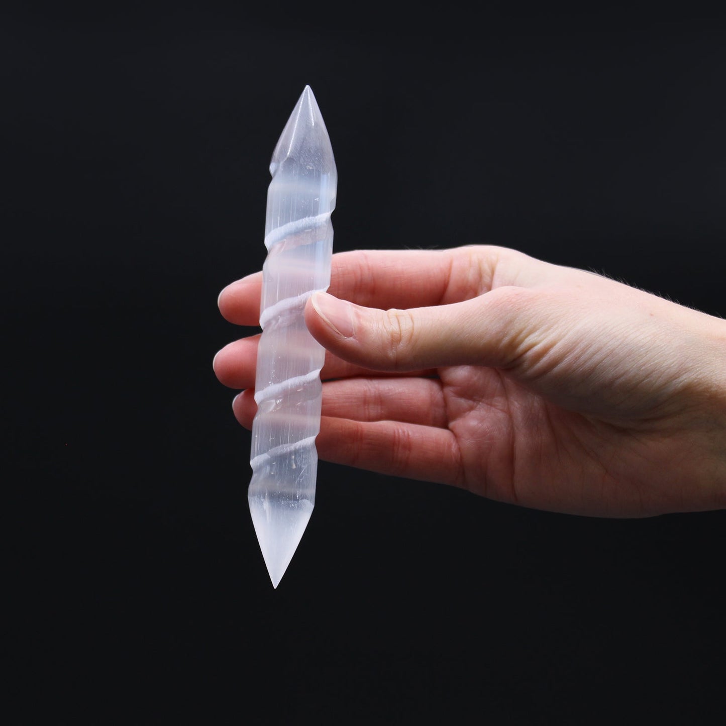 Pointed End Selenite Spiral Healing Wand product packaging on clean background from Quintessential Holistic Health Ltd