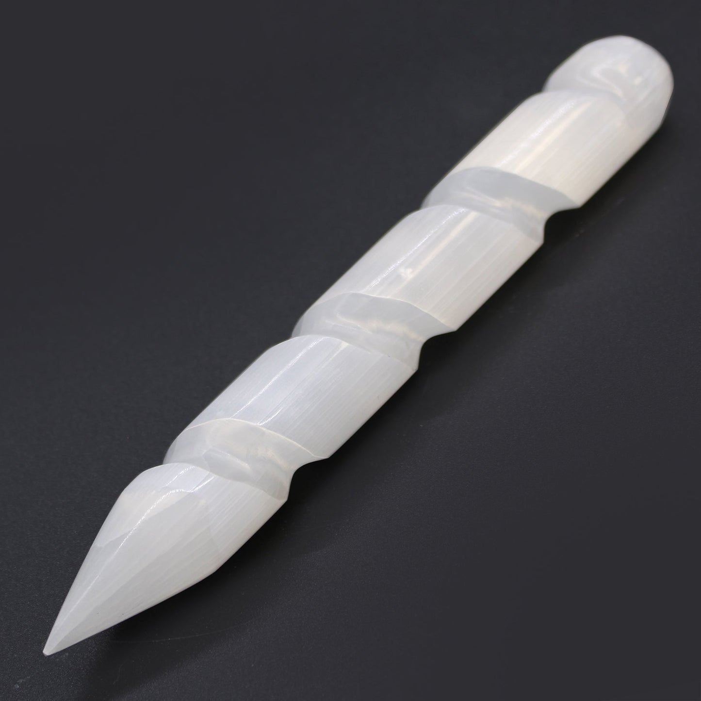 Pointed and Rounded End Selenite Spiral Healing Wand product packaging on clean background from Quintessential Holistic Health Ltd