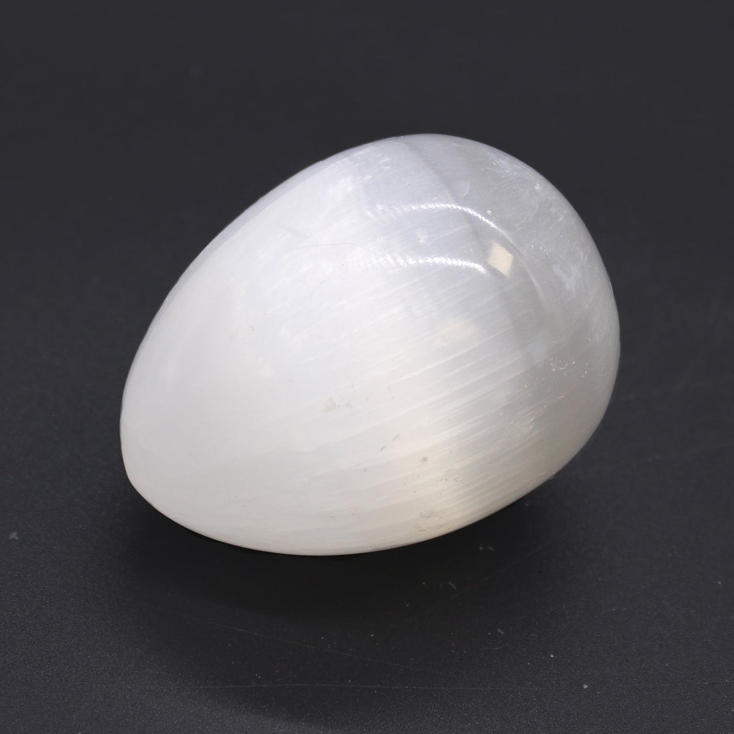 Selenite Egg - Medium product packaging on clean background from Quintessential Holistic Health Ltd