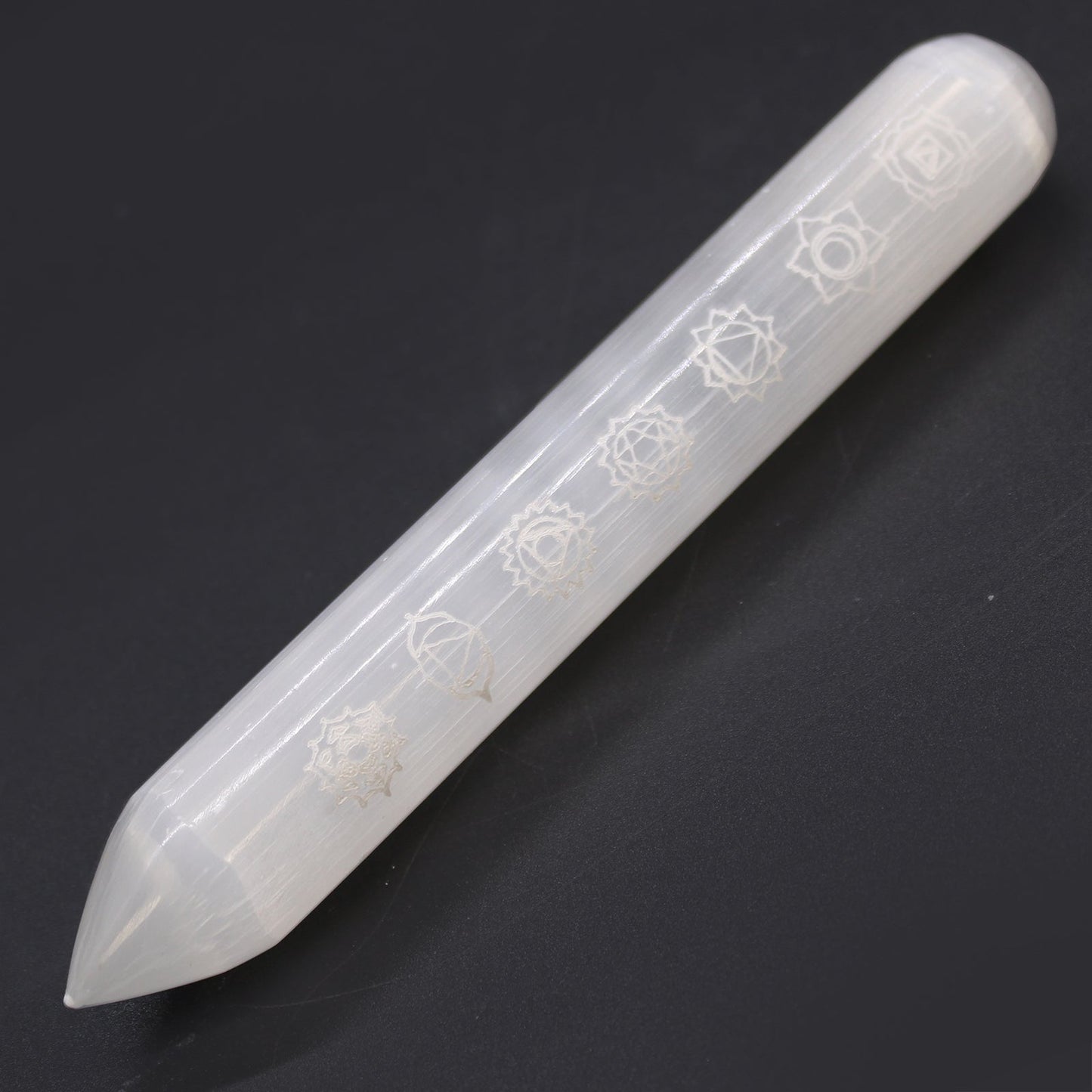 Pointed and Rounded 7 Chakra Selenite Healing Wand product packaging on clean background from Quintessential Holistic Health Ltd