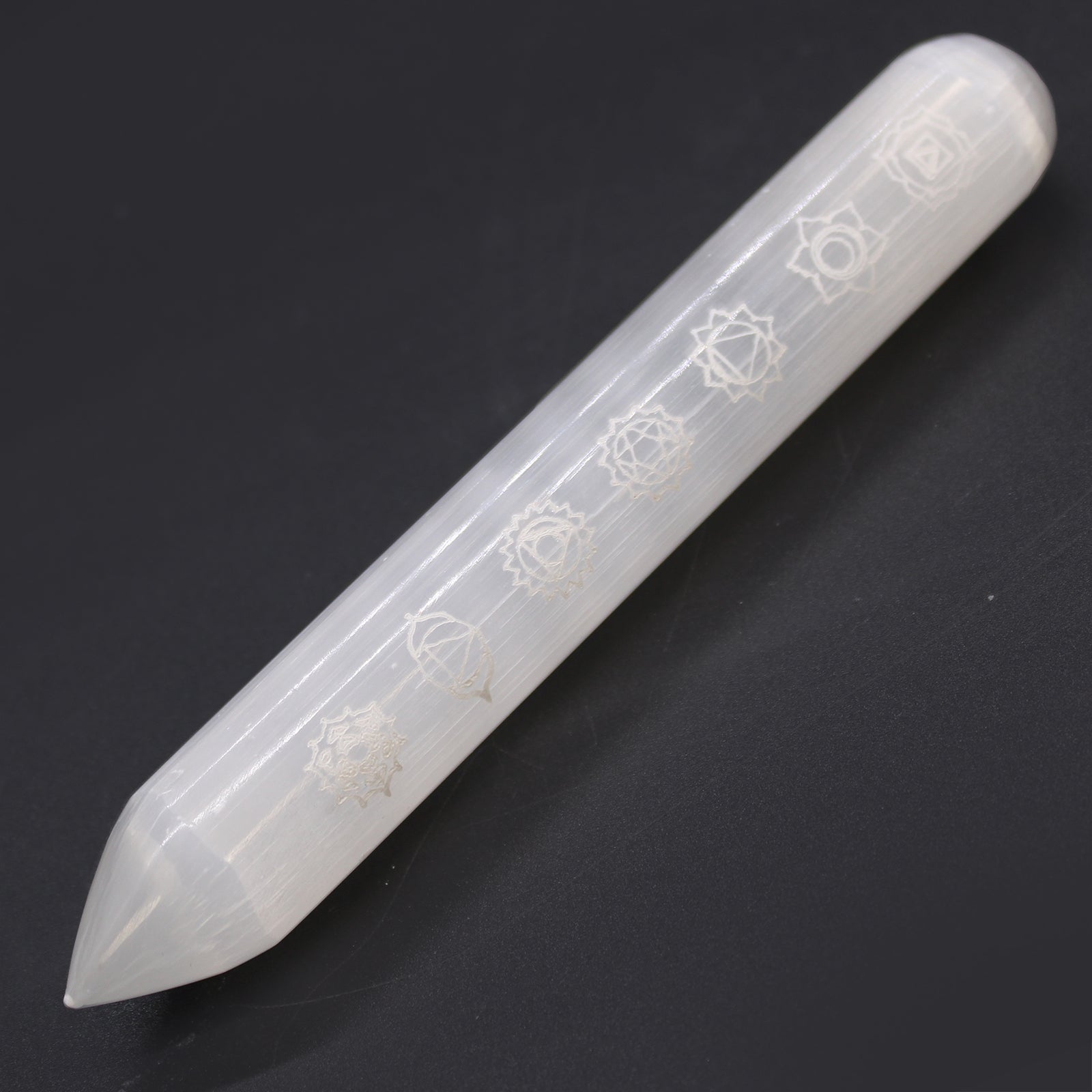 Pointed and Rounded 7 Chakra Selenite Healing Wand product packaging on clean background from Quintessential Holistic Health Ltd