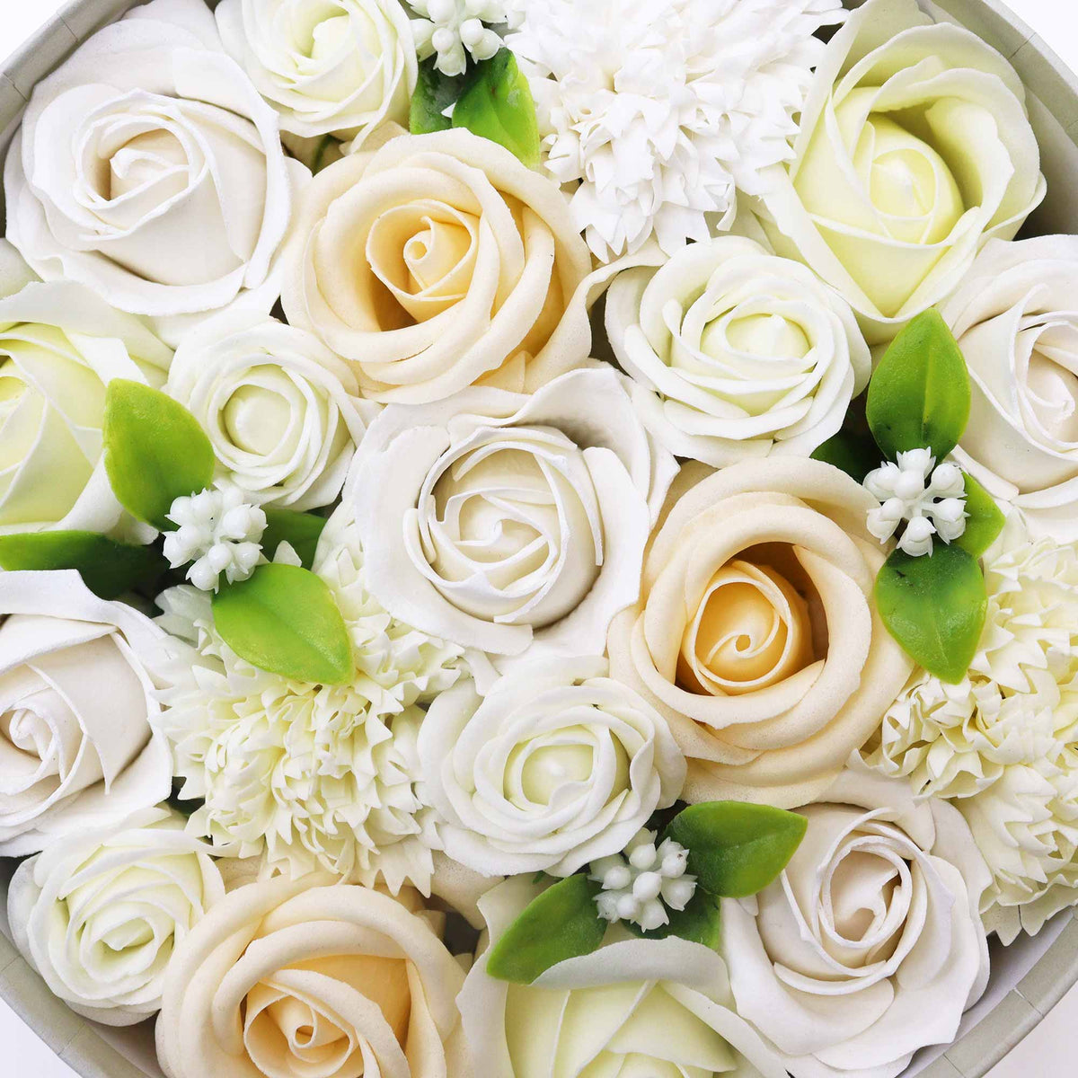 Luxury Soap Flowers - Round - Whites and Ivory, close-up of layered cream and white blooms with green leaves and small white buds, by Quintessential Holistic Health Ltd