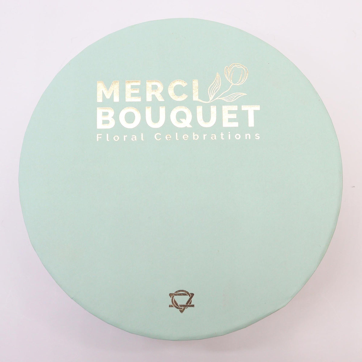 Luxury Soap Flowers - Round - Yellows and Greens, circular mint-green lid with white Merci Bouquet branding, by Quintessential Holistic Health Ltd