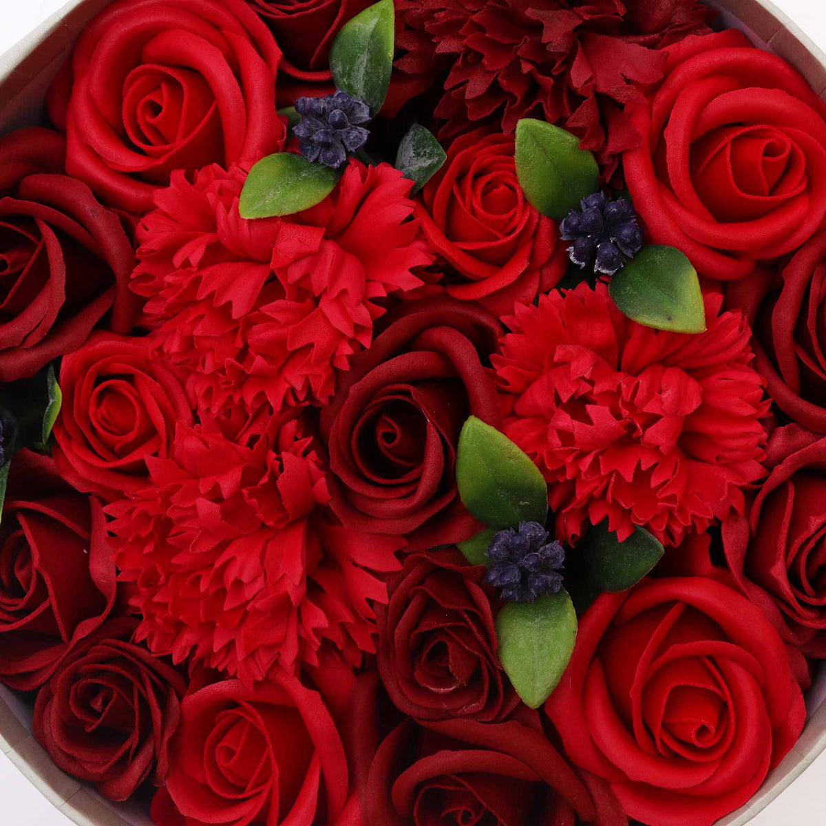 Luxury Soap Flowers - Round - Classic Reds, close-up of red roses and carnations with green leaves and dark berries, by Quintessential Holistic Health Ltd