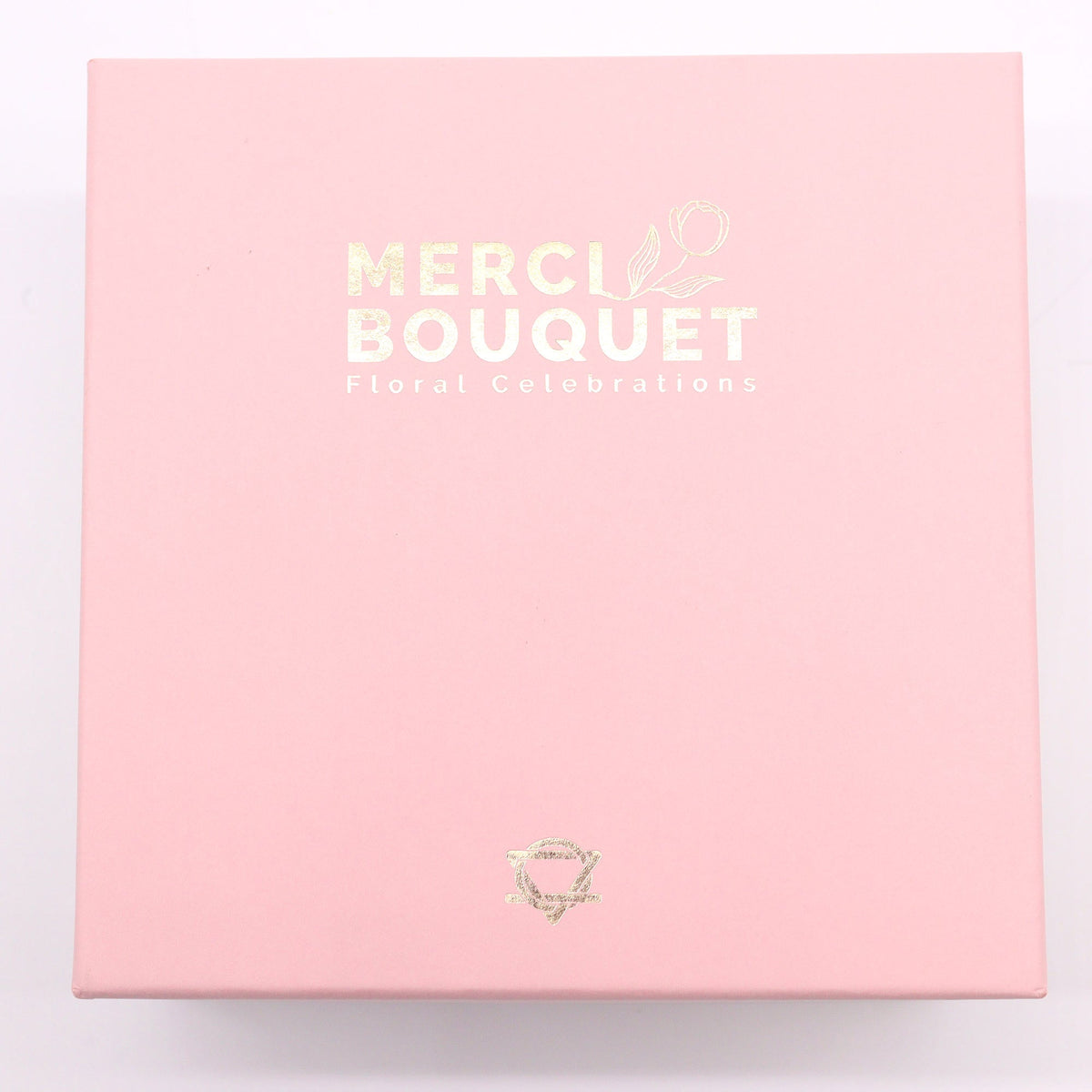 Luxury Soap Flowers - Square - Pinks, in a closed pale pink box with gold Merci Bouquet branding, by Quintessential Holistic Health Ltd