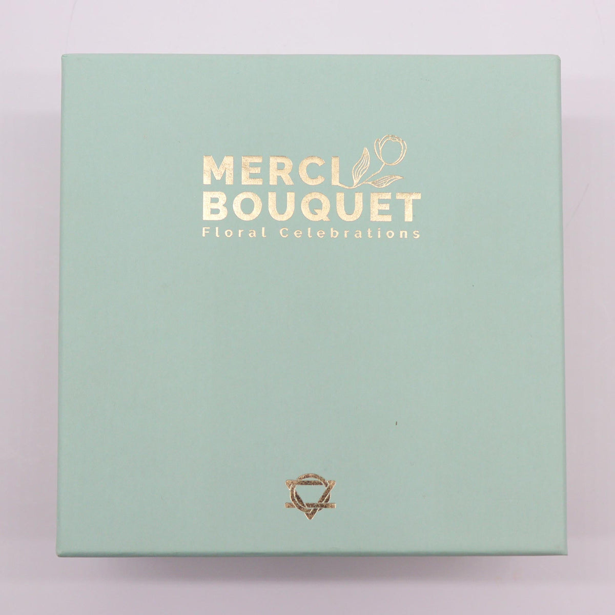 Luxury Soap Flowers - Square - Whites and Ivory in a closed pale green box with gold Merci Bouquet branding by Quintessential Holistic Health Ltd