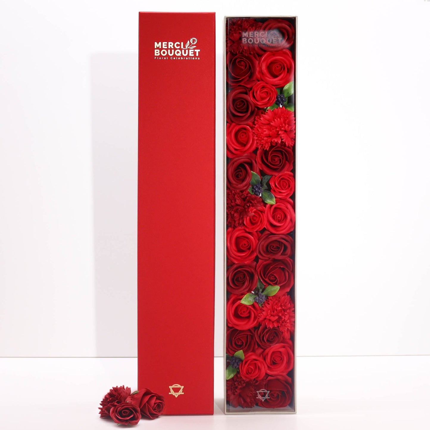 Luxury Soap Flowers - Extra Long - Classic Reds, with vivid red roses and green leaves beside an upright red cover by Quintessential Holistic Health Ltd
