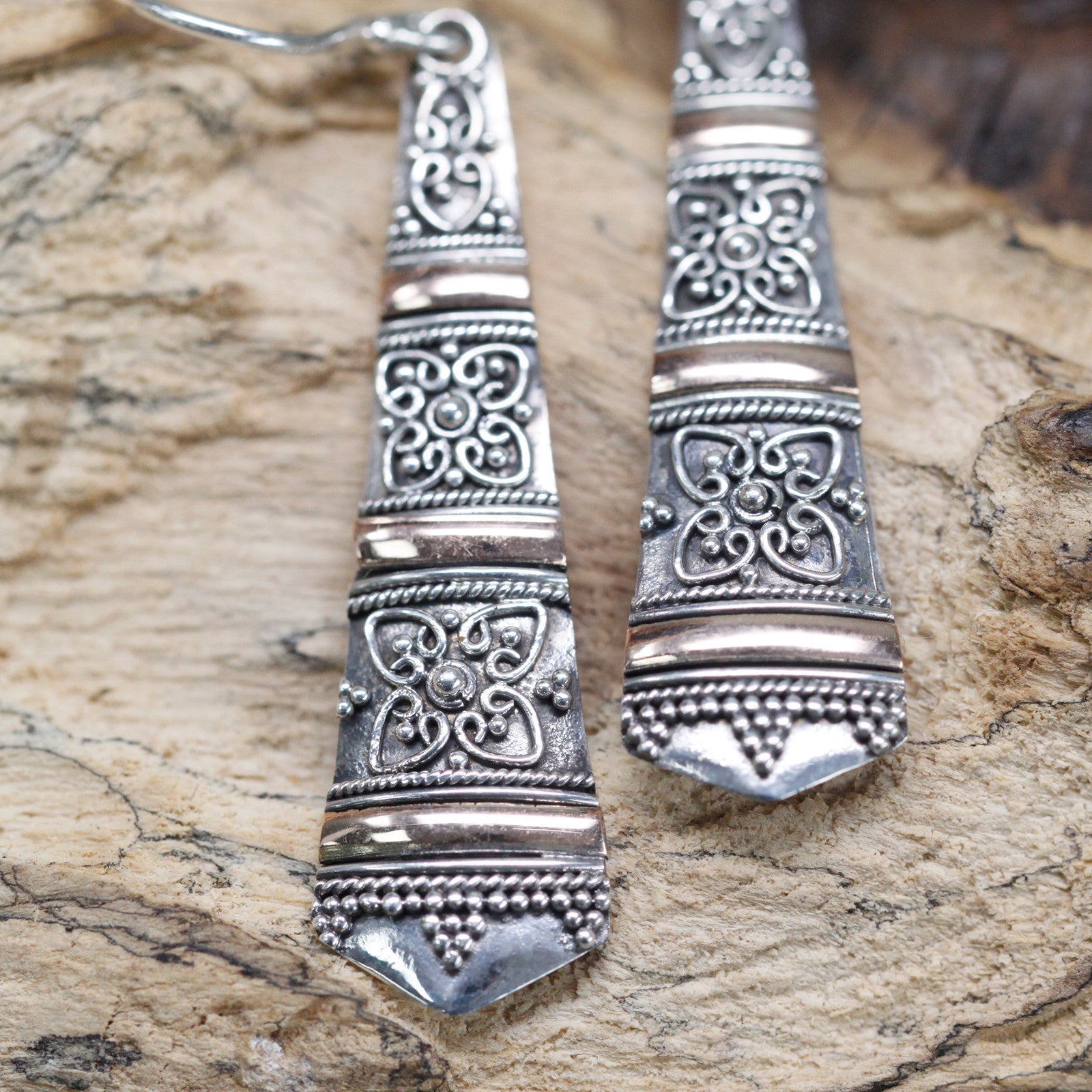 Handmade 18k Gold and 925 Silver Earrings - Tribal Drops product packaging on clean background from Quintessential Holistic Health Ltd
