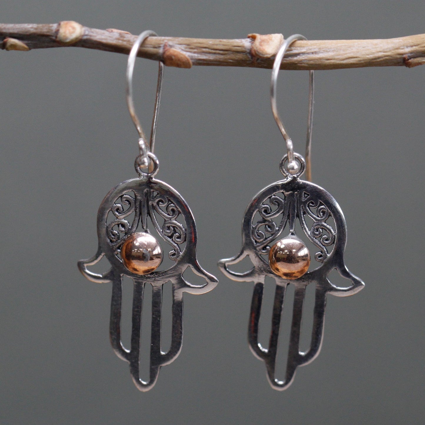Handmade 18k Gold and 925 Silver Earrings - Hamsa product packaging on clean background from Quintessential Holistic Health Ltd