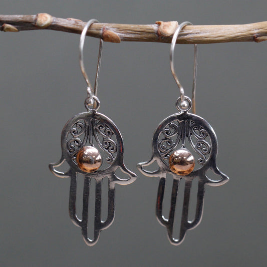 Handmade 18k Gold and 925 Silver Earrings - Hamsa product packaging on clean background from Quintessential Holistic Health Ltd