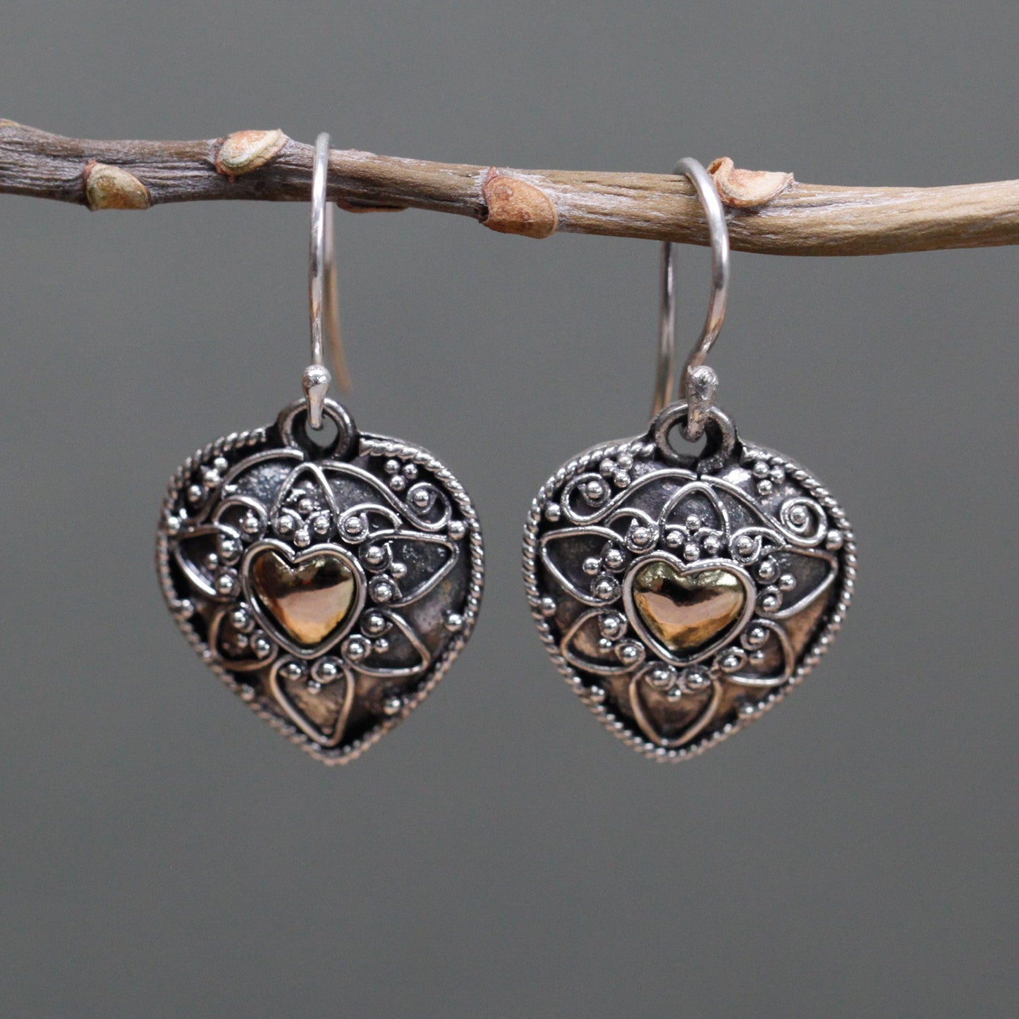 Handmade 18k Gold and 925 Silver Earrings - Mandala Hearts product packaging on clean background from Quintessential Holistic Health Ltd