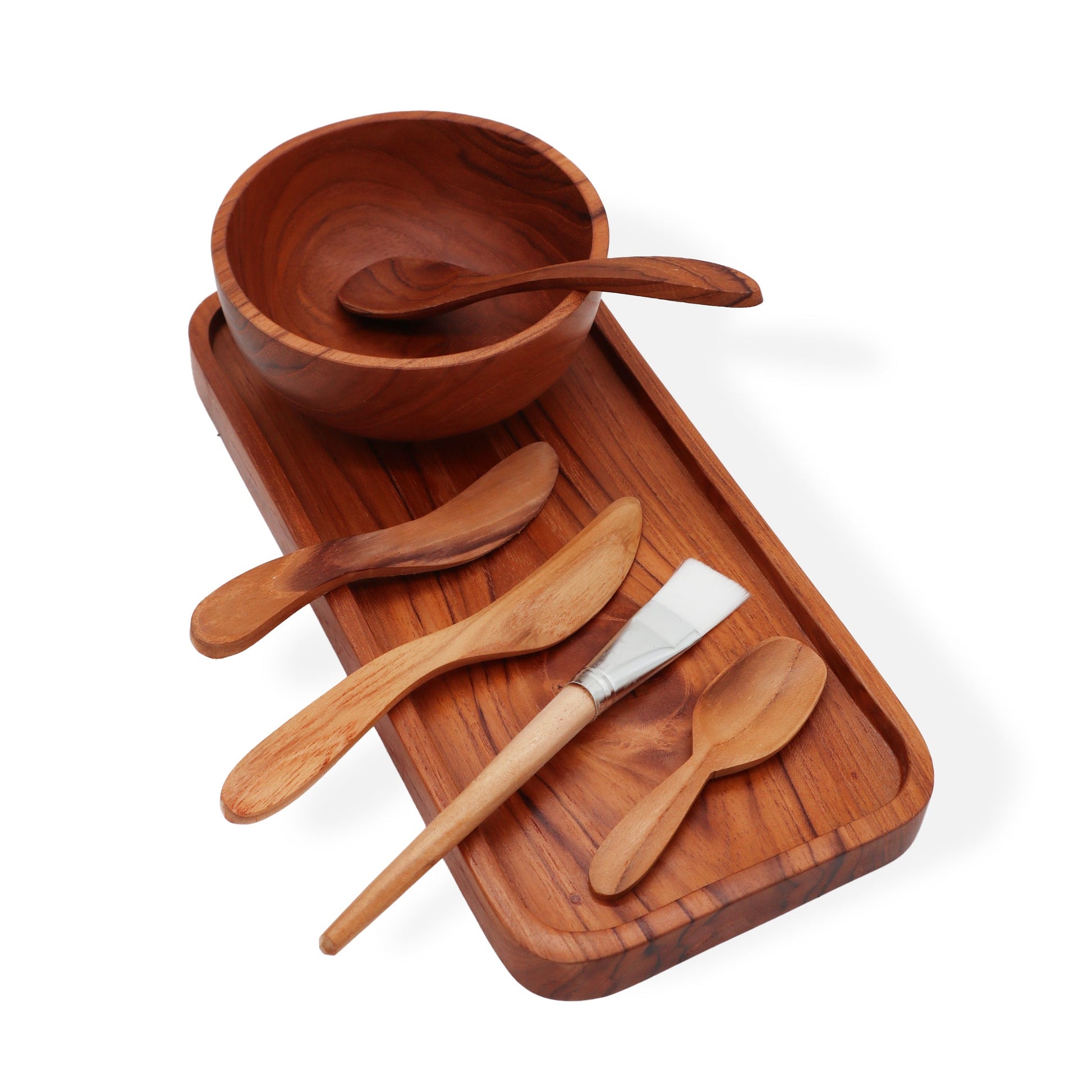 Handmade Teak Clay or Wax Spa Application Set with bowl, spoon, two brushes and assorted applicators on a long tray by Quintessential Holistic Health Ltd