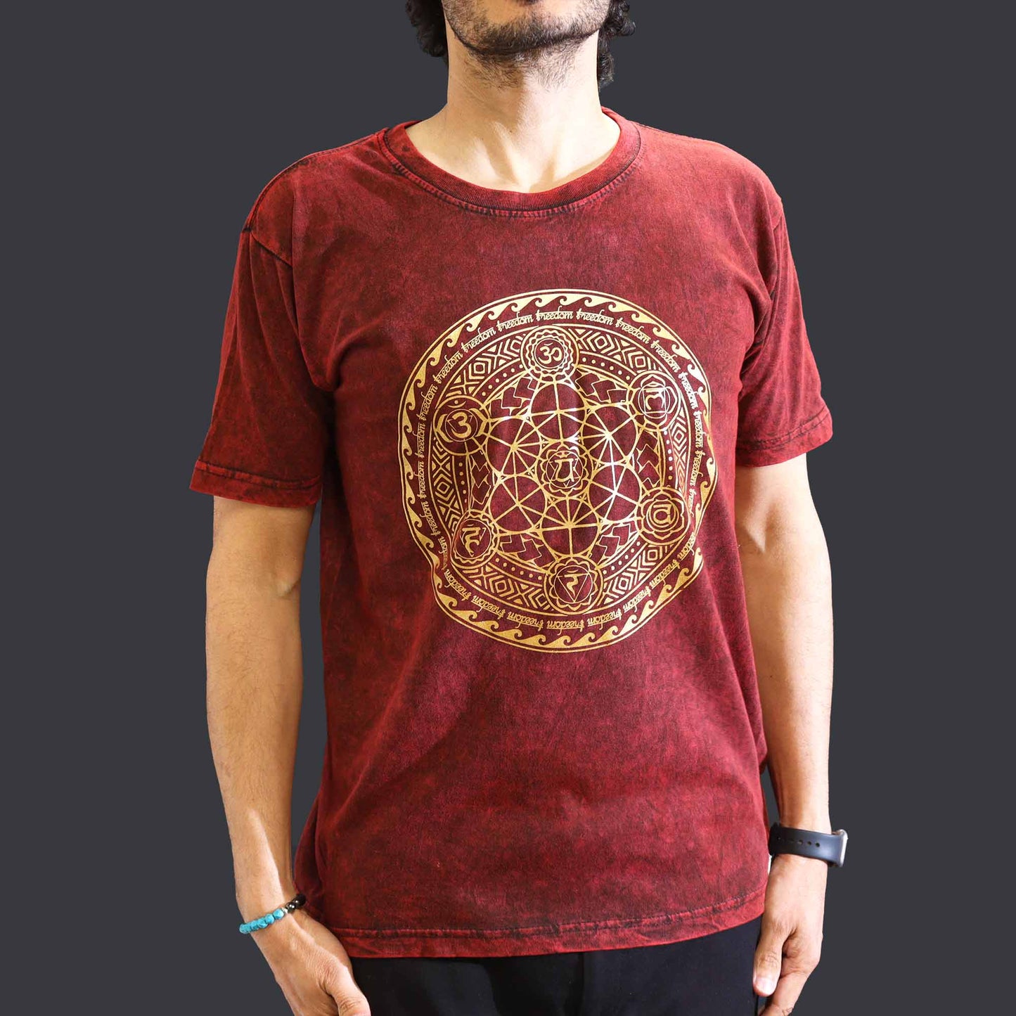 Nomad Sari Unisex Eco-Friendly 100% Cotton Stone Washed T-Shirt - Medium / Unisex / Chakra / Maroon product packaging on clean background from Quintessential Holistic Health Ltd