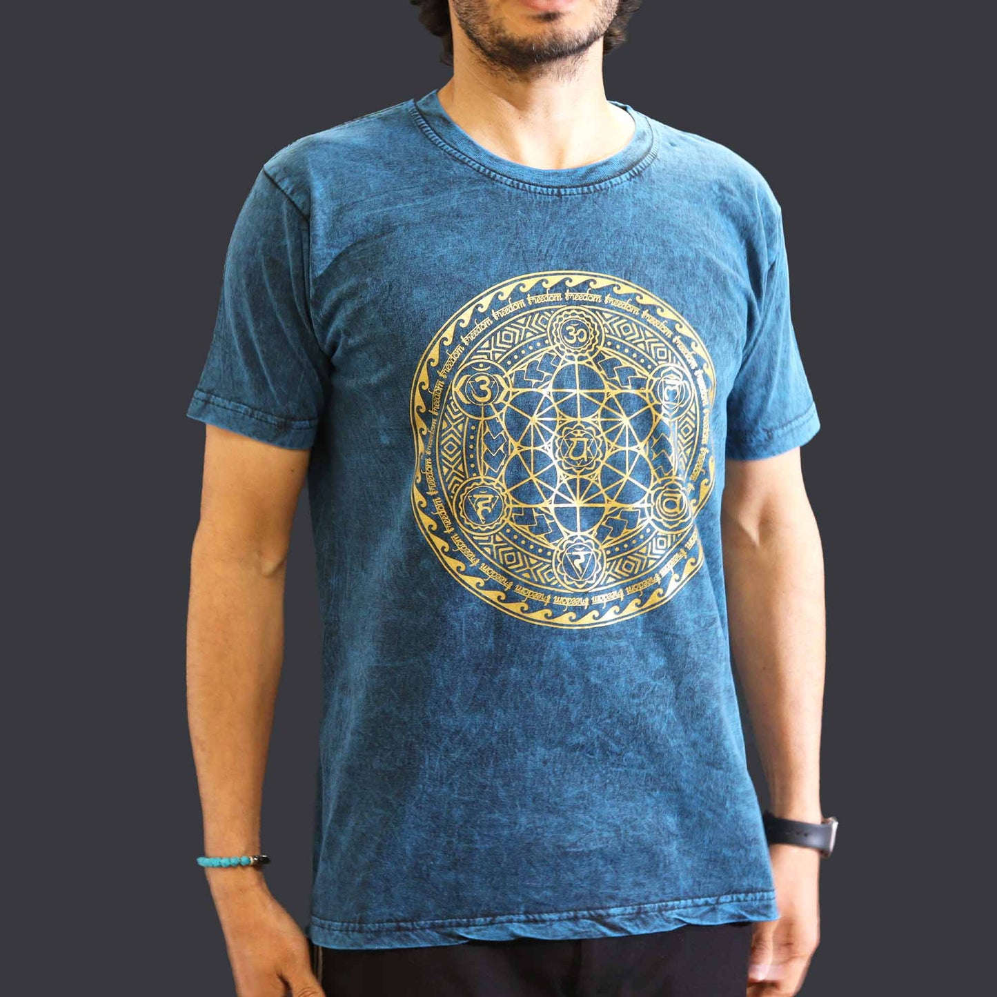 Nomad Sari Unisex Eco-Friendly 100% Cotton Stone Washed T-Shirt - Medium / Unisex / Chakra / Blue product packaging on clean background from Quintessential Holistic Health Ltd