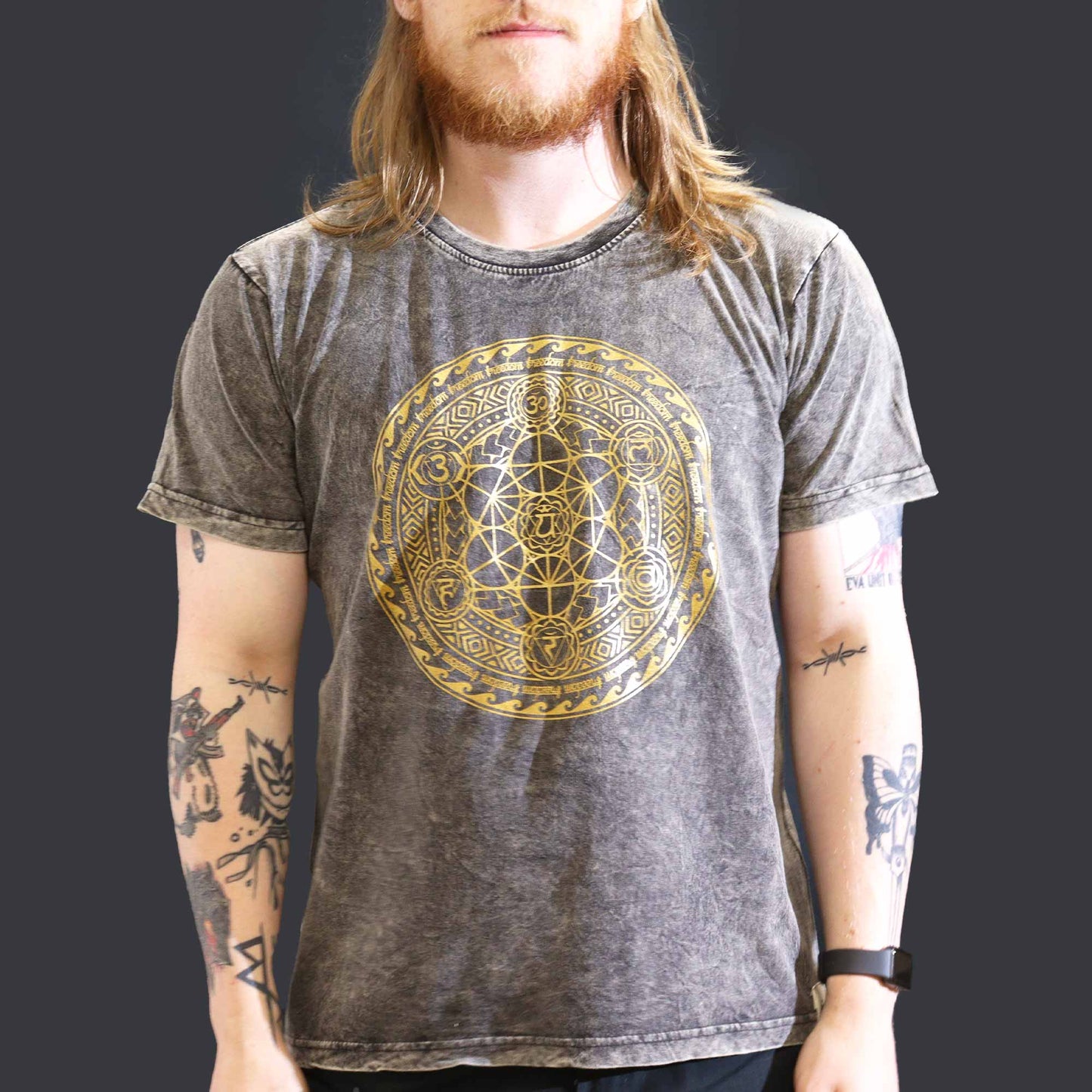 Nomad Sari Unisex Eco-Friendly 100% Cotton Stone Washed T-Shirt - Large / Unisex / Chakra / Dark Grey product packaging on clean background from Quintessential Holistic Health Ltd