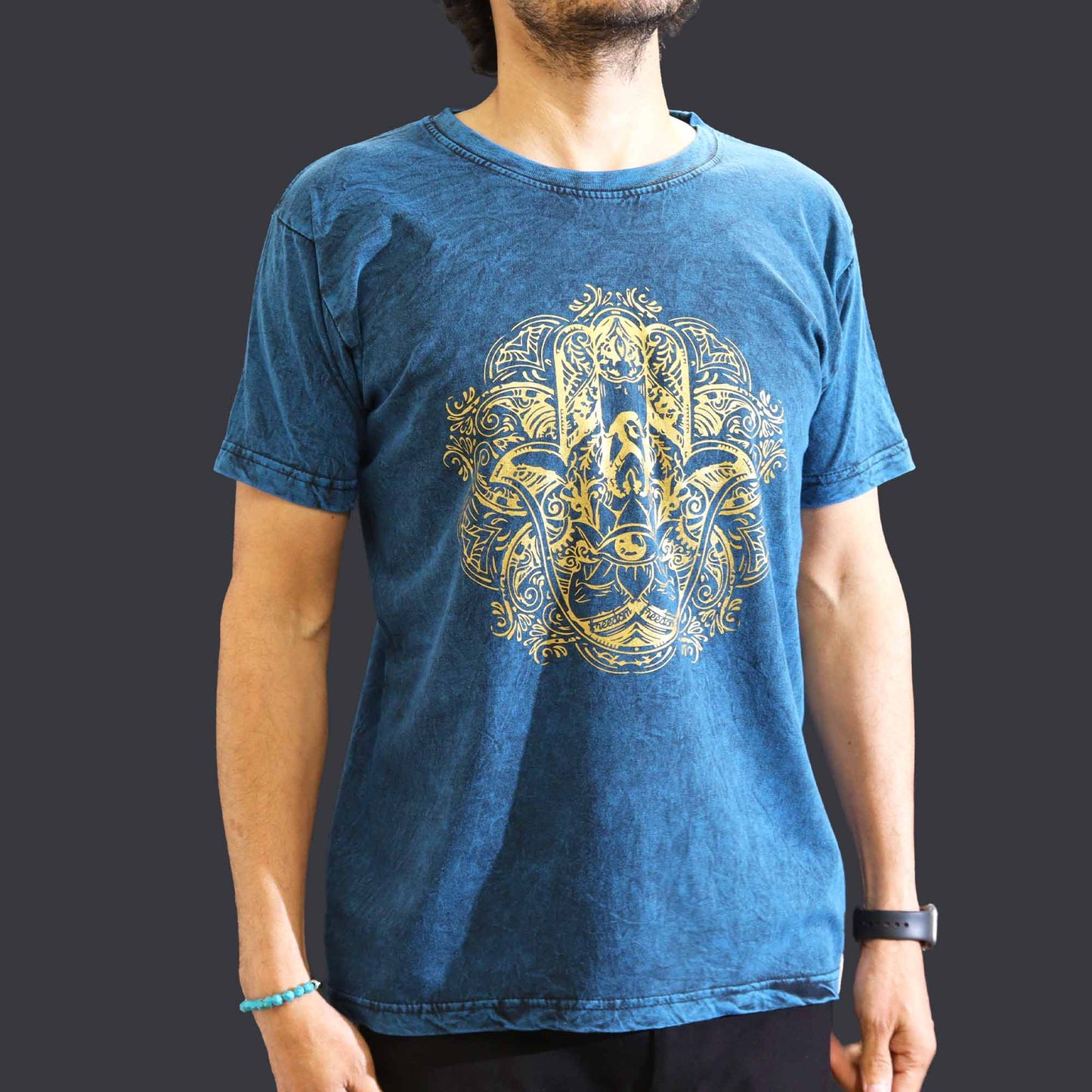 Nomad Sari Unisex Eco-Friendly 100% Cotton Stone Washed T-Shirt - Medium / Unisex / Hamsa / Blue product packaging on clean background from Quintessential Holistic Health Ltd