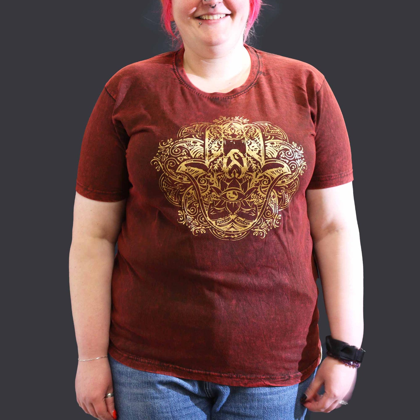 Nomad Sari Unisex Eco-Friendly 100% Cotton Stone Washed T-Shirt - Extra Large / Unisex / Hamsa / Maroon product packaging on clean background from Quintessential Holistic Health Ltd