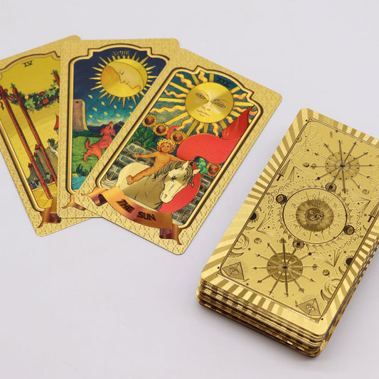Golden Tarot Cards product packaging on clean background from Quintessential Holistic Health Ltd