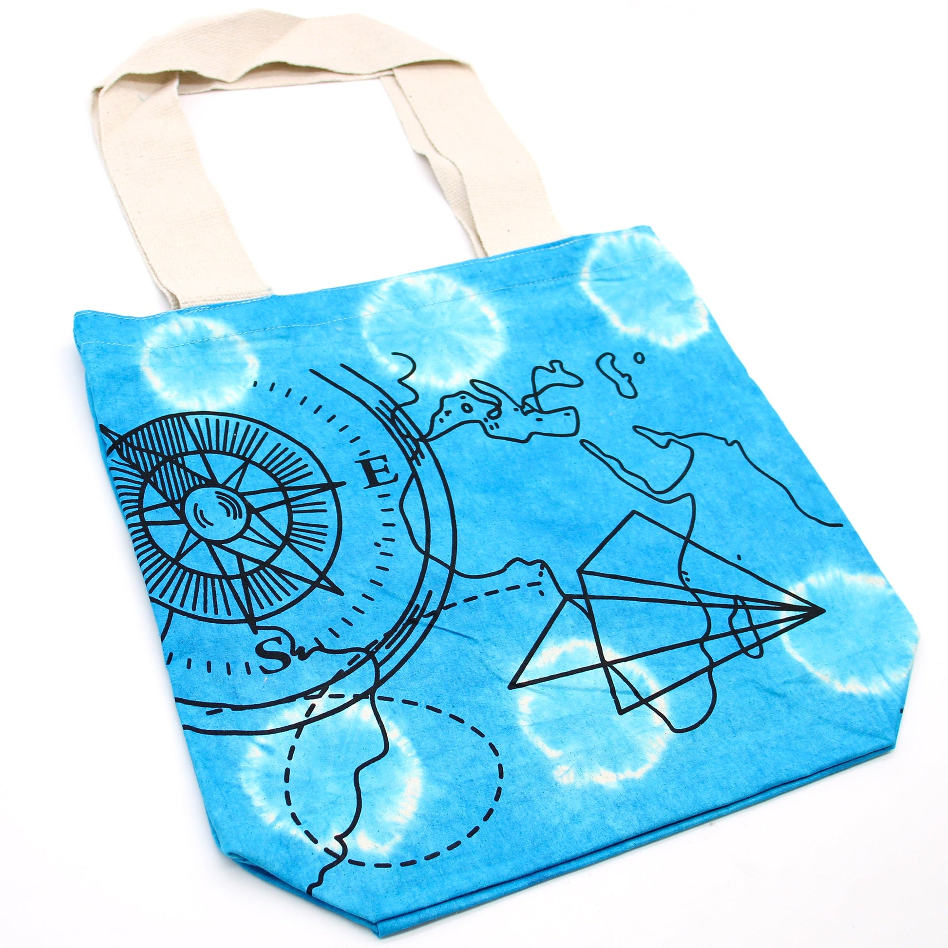 Tie-Dyed Cotton Tote Bag - Compass - Blue, with a turquoise tie-dye pattern and black travel-themed line artwork by Quintessential Holistic Health Ltd