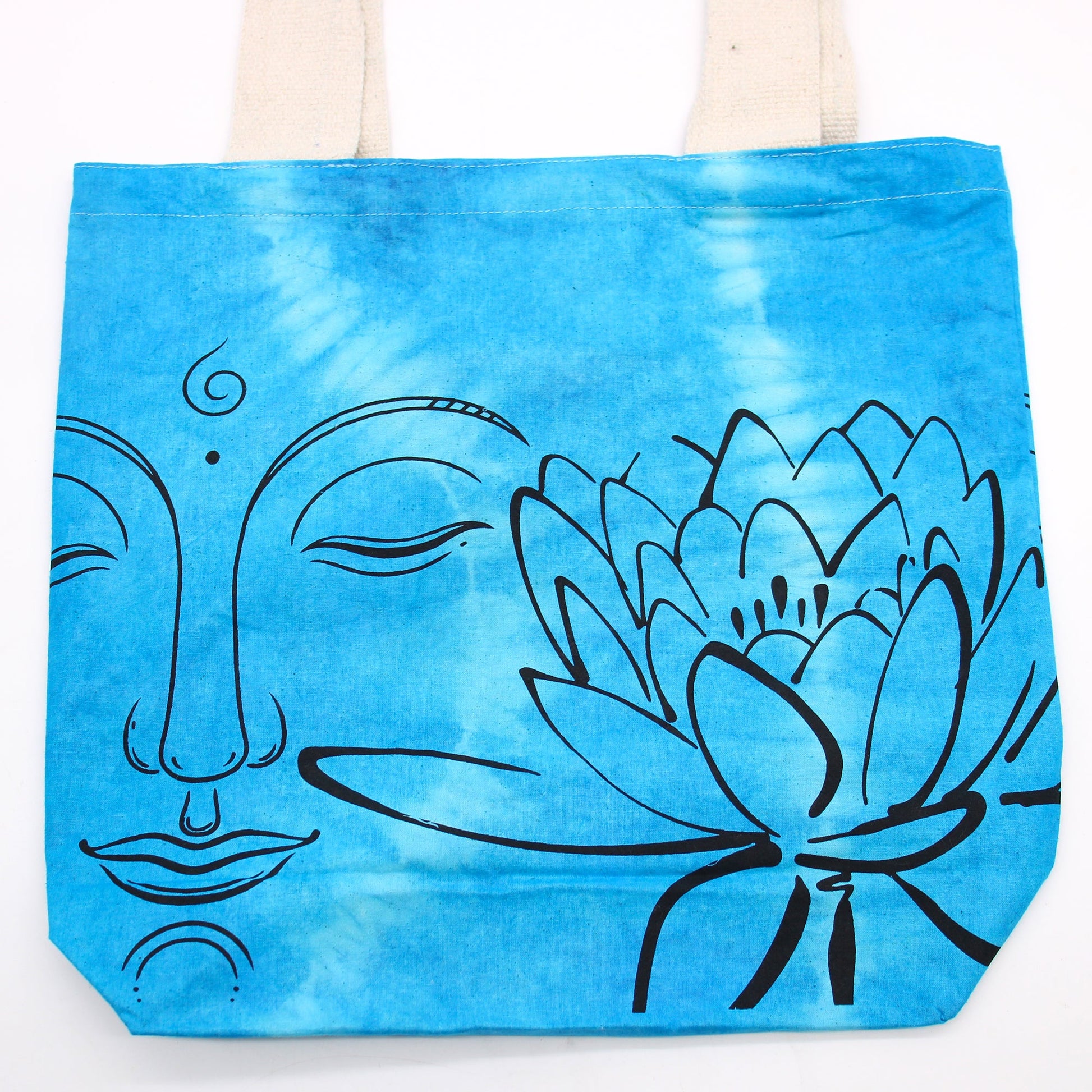 Tie-Dyed Cotton Tote Bag - Buddha and Lotus Flower - Blue with bold black facial and lotus linework across the front by Quintessential Holistic Health Ltd