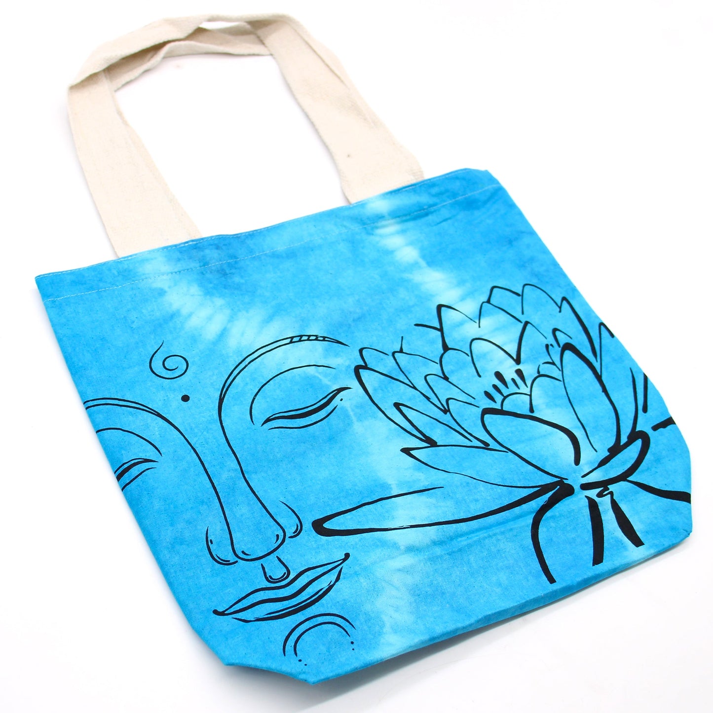 Tie-Dyed Cotton Tote Bag - Buddha and Lotus Flower - Blue with a serene outlined face and large lotus across blue tie-dye by Quintessential Holistic Health Ltd