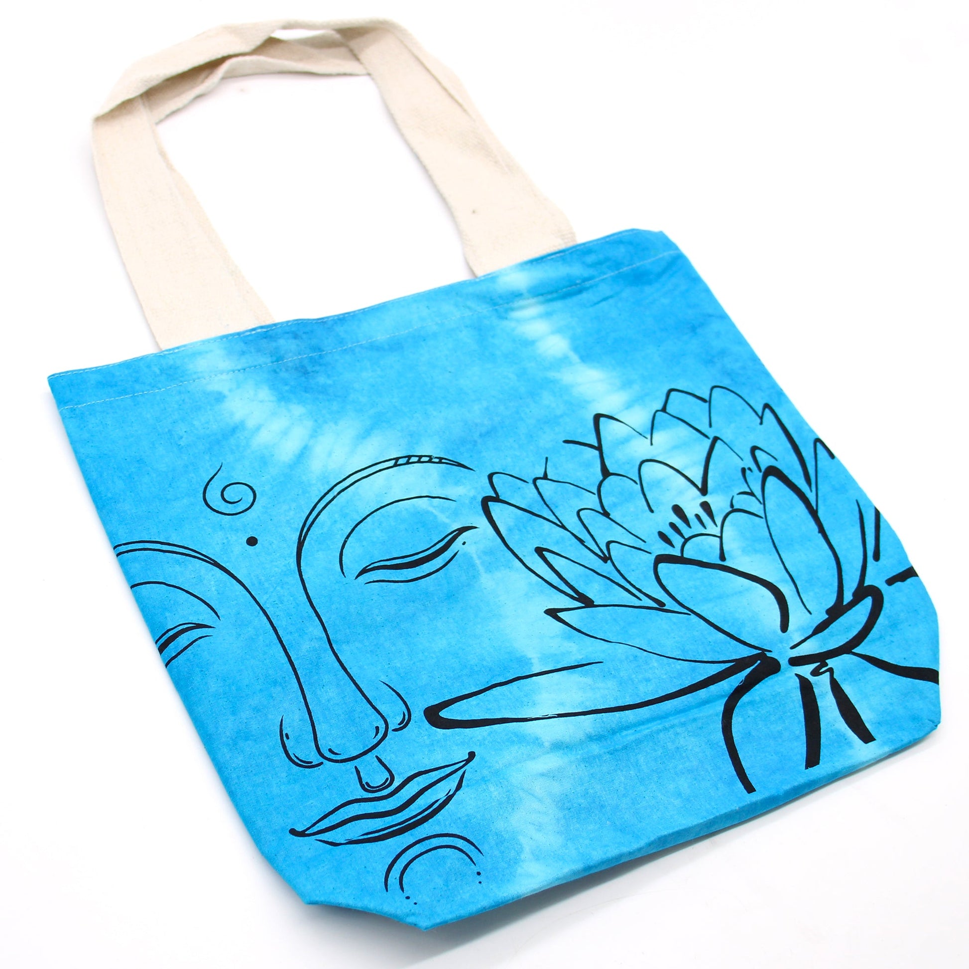 Tie-Dyed Cotton Tote Bag - Buddha and Lotus Flower - Blue with a serene outlined face and large lotus across blue tie-dye by Quintessential Holistic Health Ltd