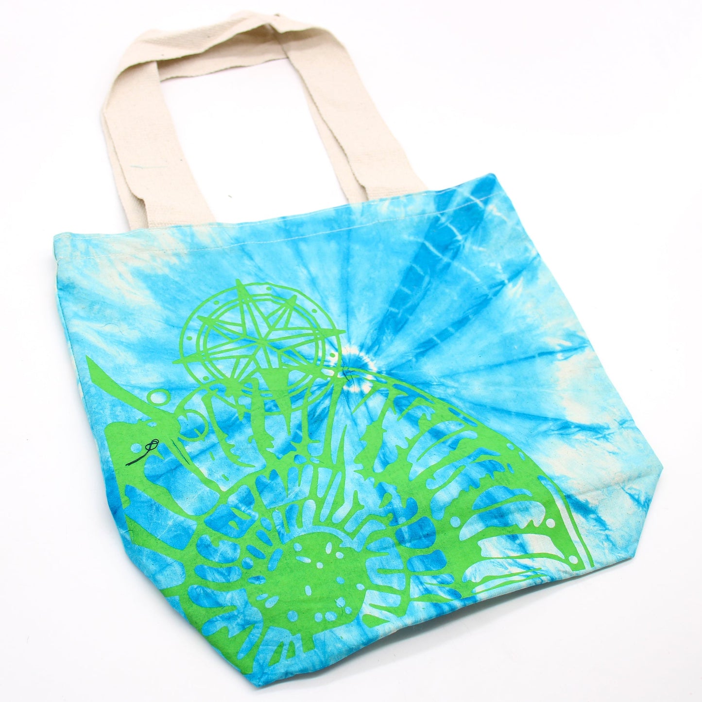 Tie-Dyed Cotton Tote Bag - Seashell - Blue and Green with a green spiral shell over radiating blue and white colouring by Quintessential Holistic Health Ltd