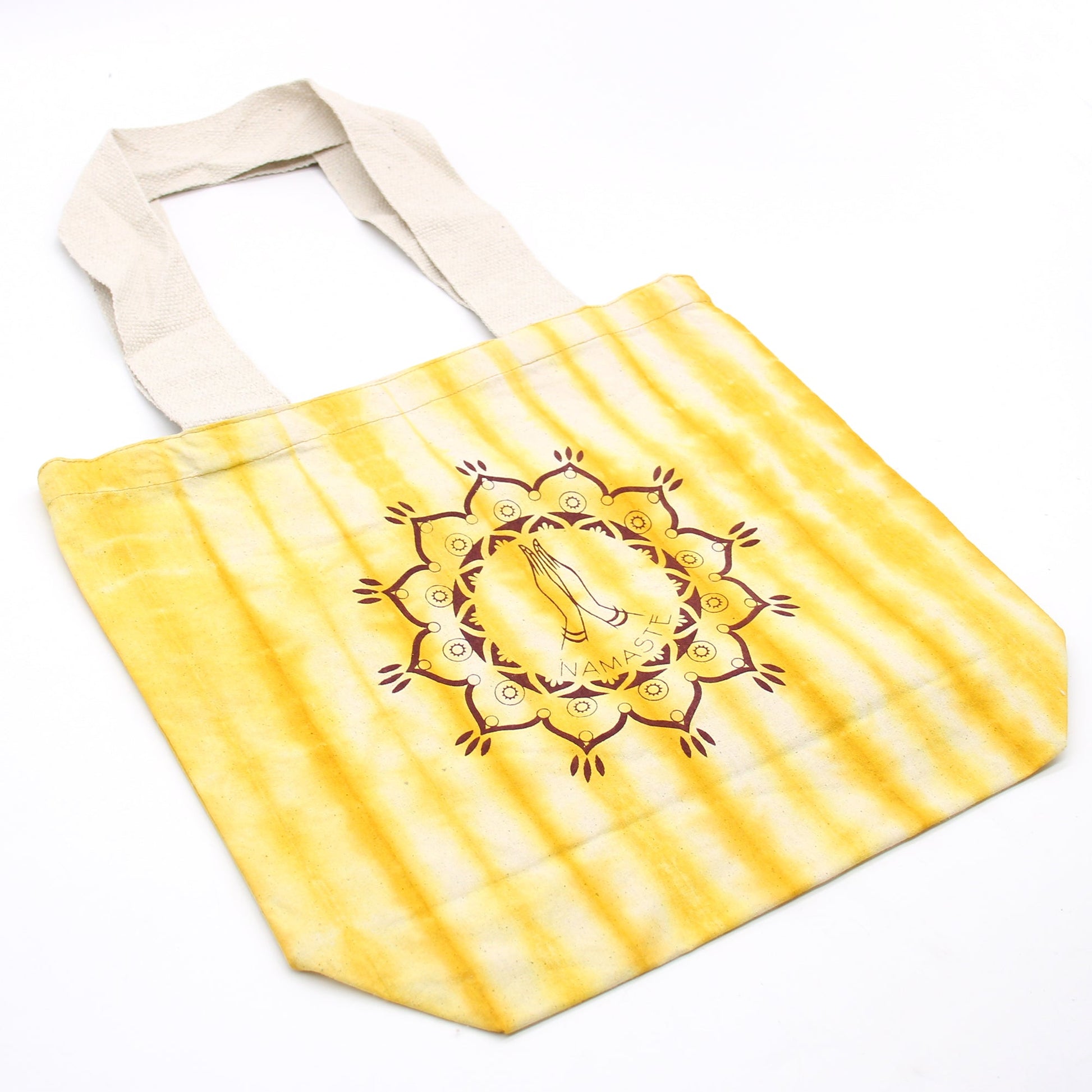 Tie-Dyed Cotton Tote Bag - Namaste Hands - Yellow with yellow stripes and a circular hands-and-mandala design by Quintessential Holistic Health Ltd