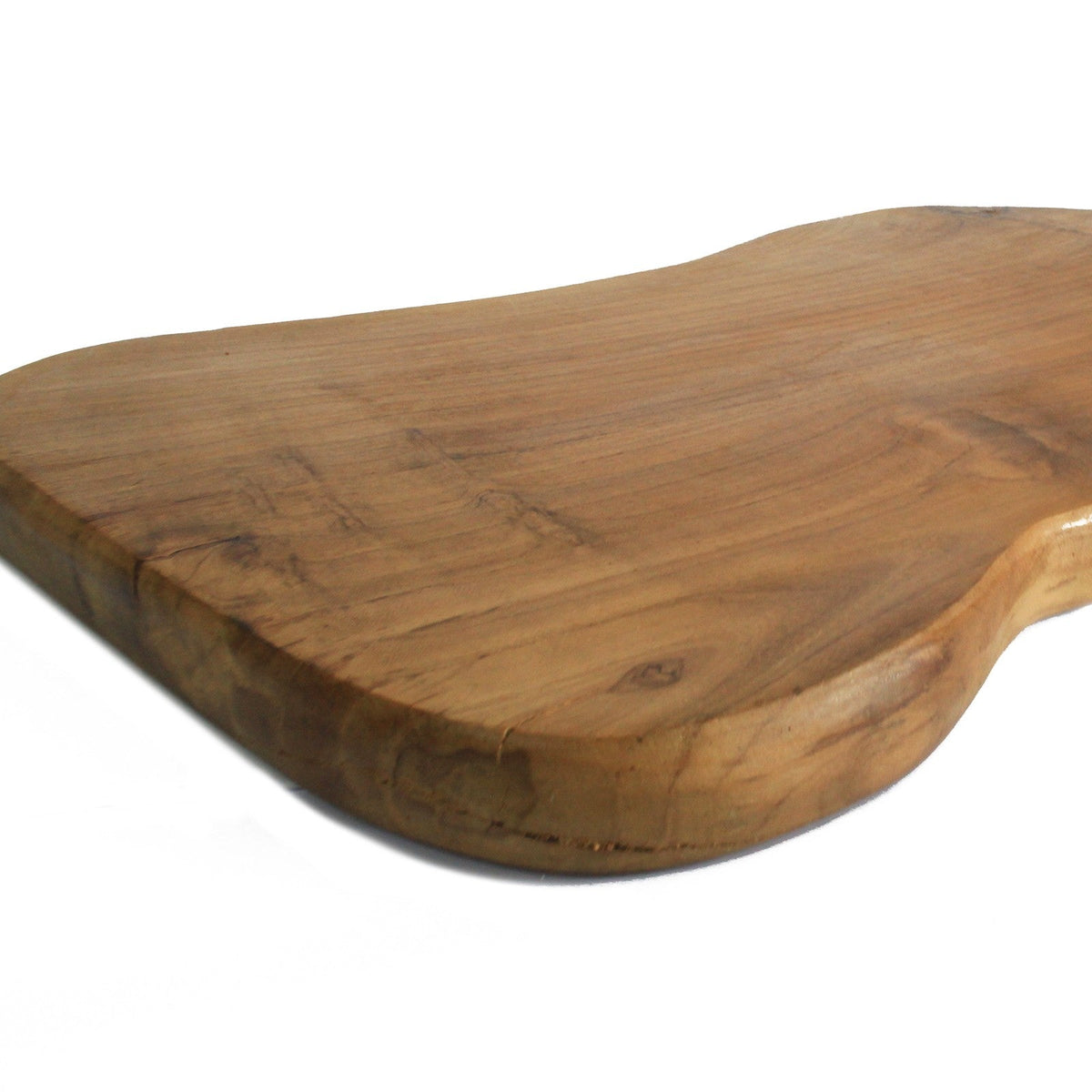 Hand-Carved Sustainable Teak Chopping Board - Medium, thick warm brown board with a rounded irregular edge and dark grain, by Quintessential Holistic Health Ltd
