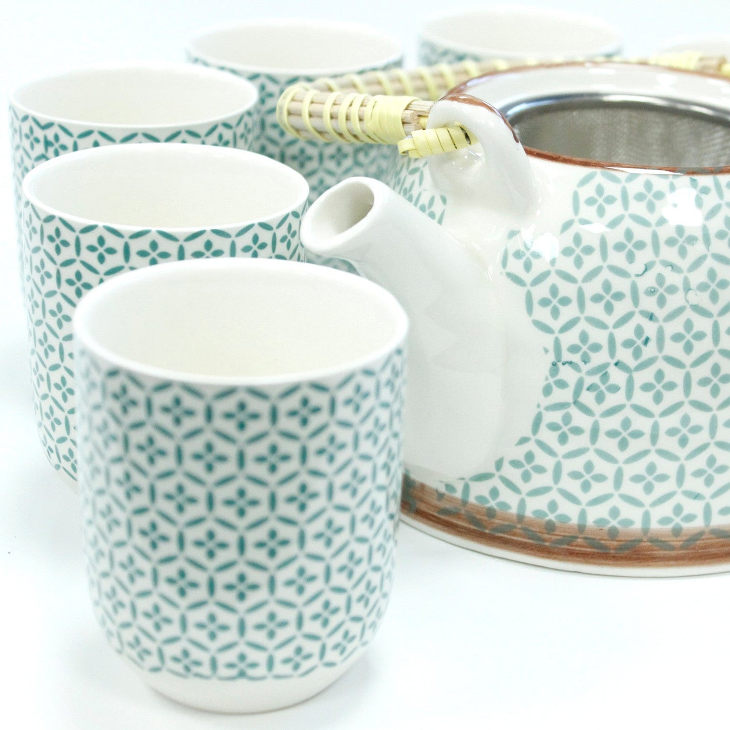 650ml Green Mosaic Design White Ceramic Teapot with a Strainer and a 6 Matching Cup Set product packaging on clean background from Quintessential Holistic Health Ltd