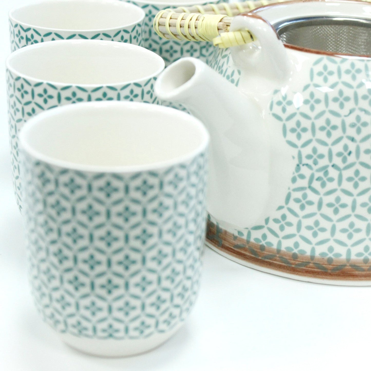 650ml Green Mosaic Design White Ceramic Teapot with a Strainer and a 6 Matching Cup Set product packaging on clean background from Quintessential Holistic Health Ltd