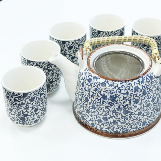 650ml Blue Patterned Design White Ceramic Herbal Teapot with a Strainer and a 6 Matching Cup Set product packaging on clean background from Quintessential Holistic Health Ltd