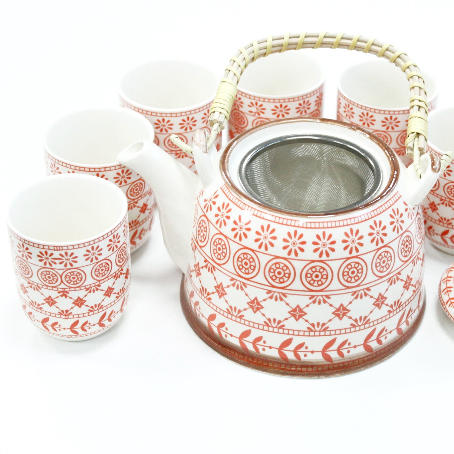650ml Amber Design White Glazed Ceramic Herbal Teapot with a Strainer and a 6 Matching Cup Set product packaging on clean background from Quintessential Holistic Health Ltd
