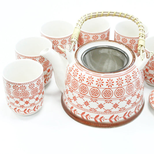 650ml Amber Design White Glazed Ceramic Herbal Teapot with a Strainer and a 6 Matching Cup Set product packaging on clean background from Quintessential Holistic Health Ltd