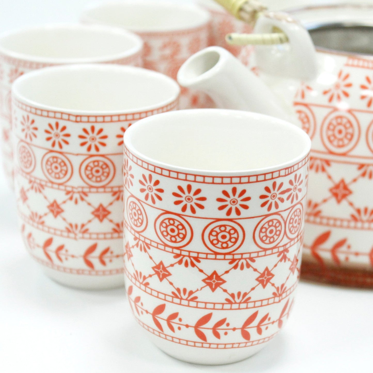 650ml Amber Design White Glazed Ceramic Herbal Teapot with a Strainer and a 6 Matching Cup Set product packaging on clean background from Quintessential Holistic Health Ltd