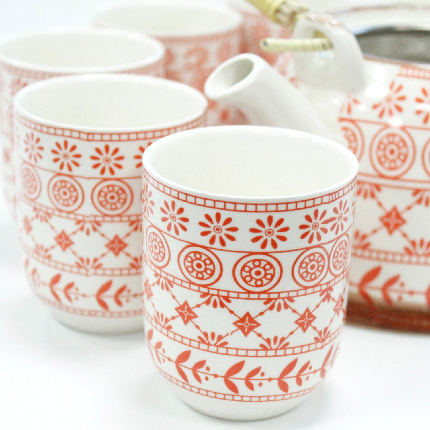650ml Amber Design White Glazed Ceramic Herbal Teapot with a Strainer and a 6 Matching Cup Set product packaging on clean background from Quintessential Holistic Health Ltd