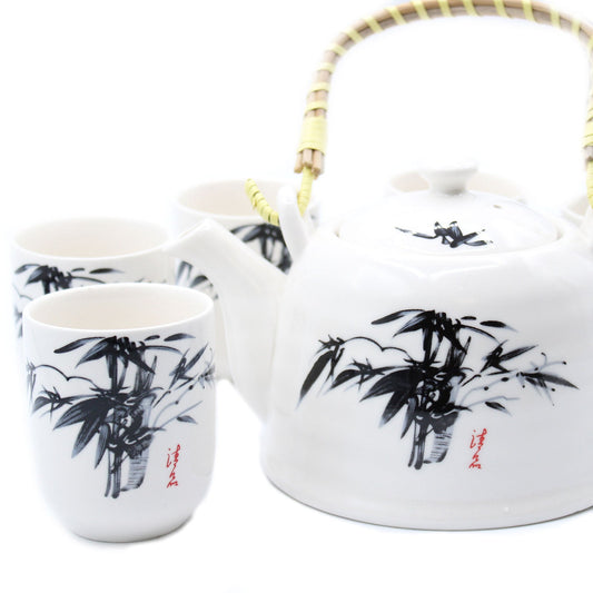 650ml Oriental Black Bamboo Design White Ceramic Teapot with a Strainer and a 6 Matching Cup Set product packaging on clean background from Quintessential Holistic Health Ltd