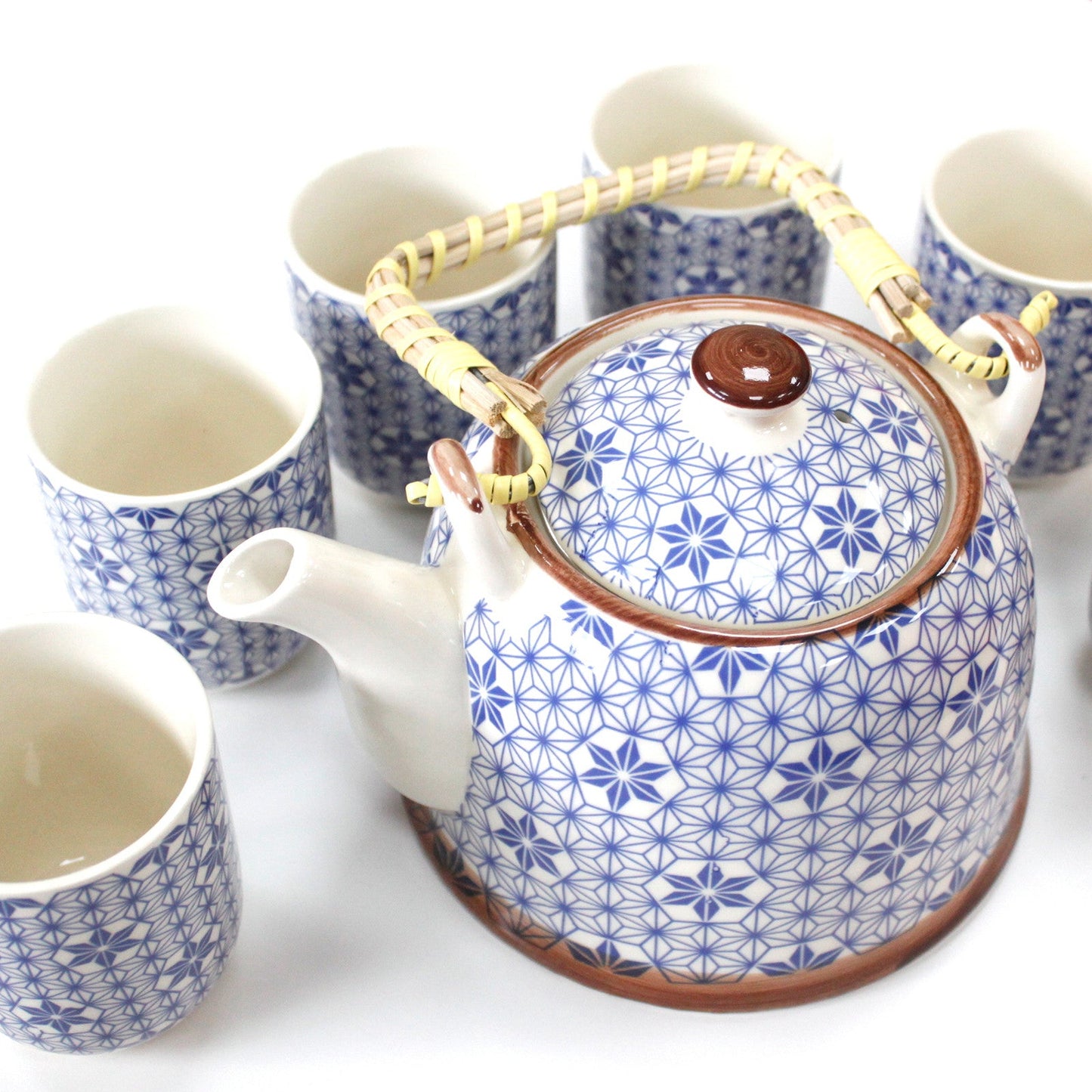 650ml Blue Star Design White Ceramic Herbal Teapot with a Strainer and a 6 Matching Cup Set product packaging on clean background from Quintessential Holistic Health Ltd
