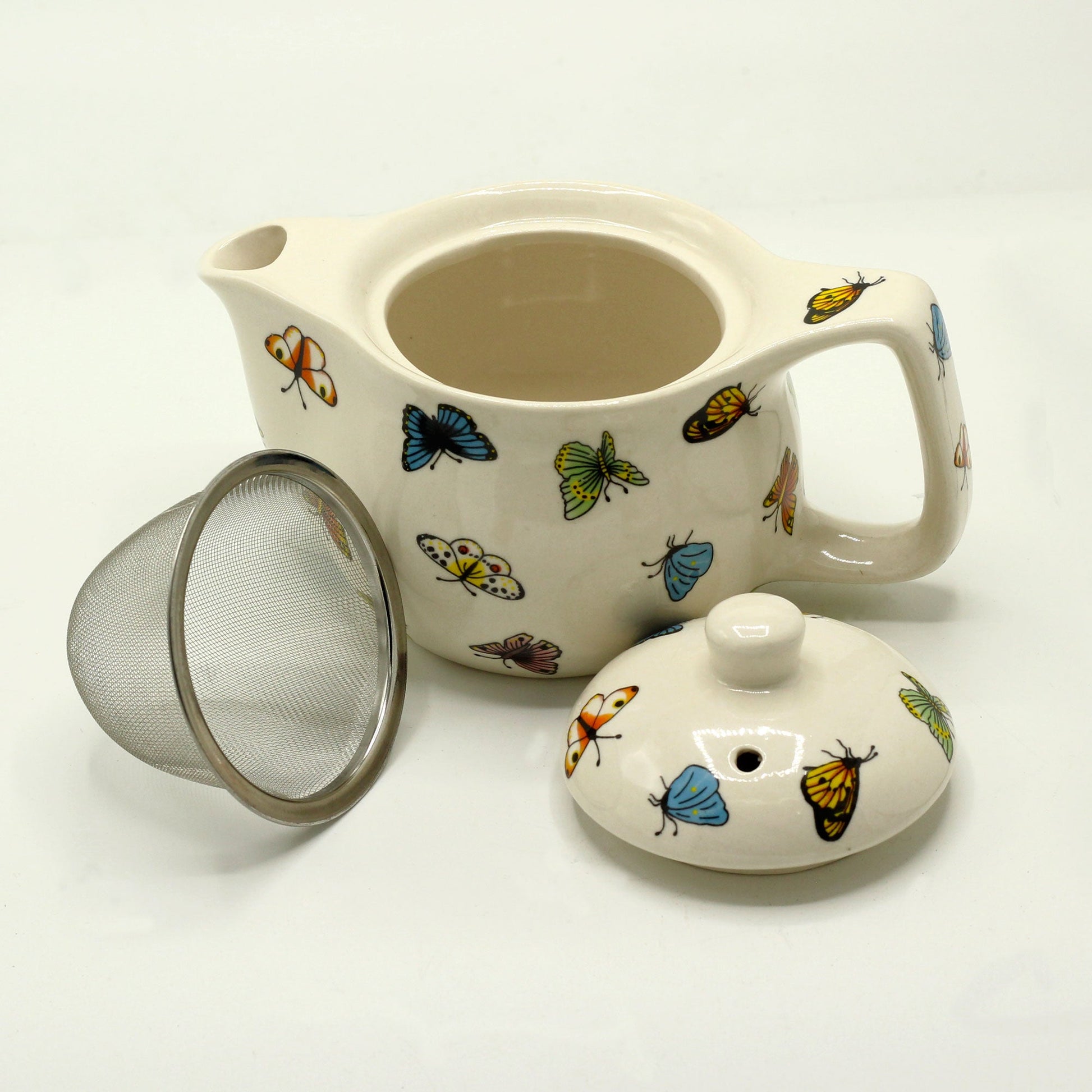 350ml Small Ceramic Butterfly Design Herbal Teapot and Strainer product packaging on clean background from Quintessential Holistic Health Ltd