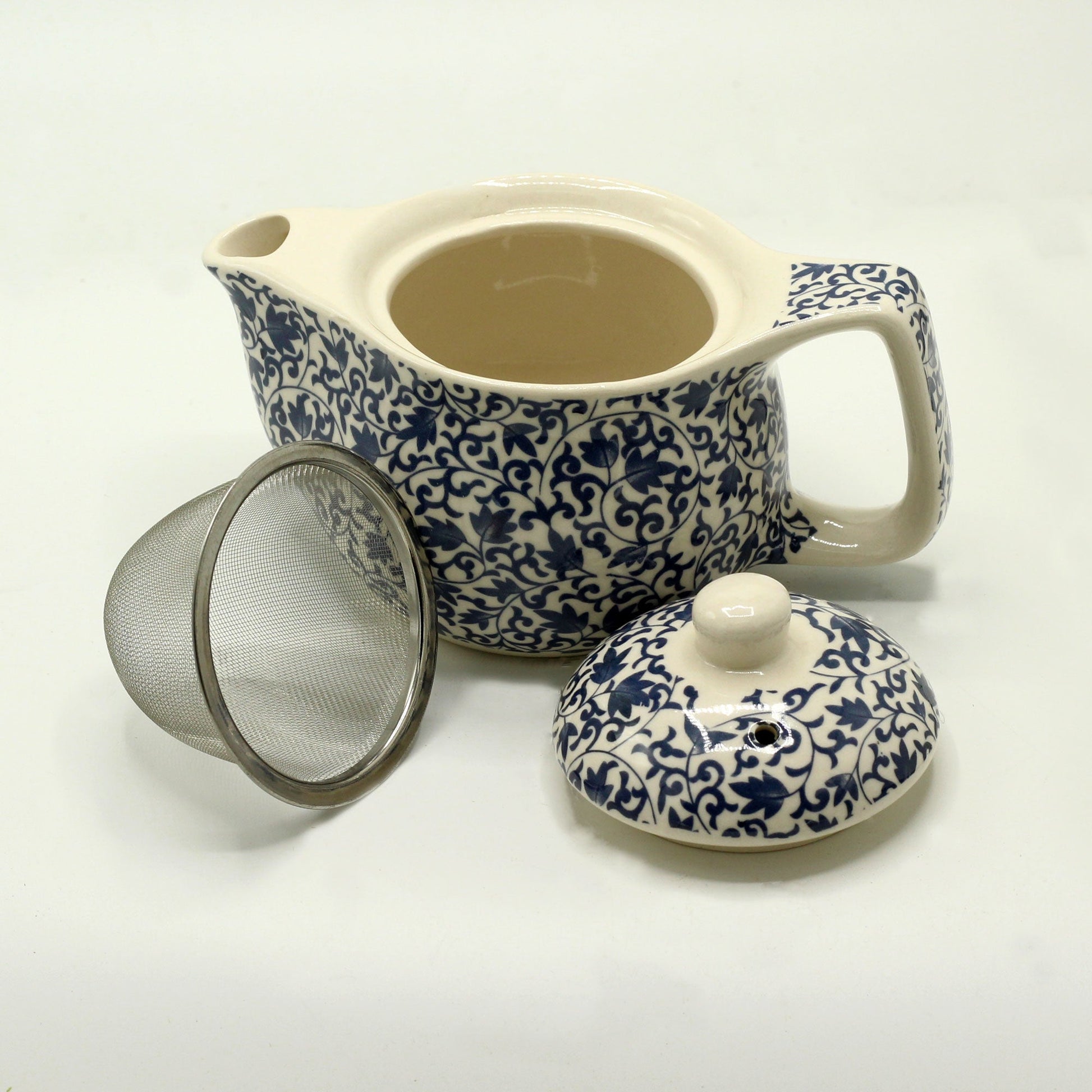350ml Small Ceramic Blue Patterned Design Herbal Teapot and Strainer product packaging on clean background from Quintessential Holistic Health Ltd