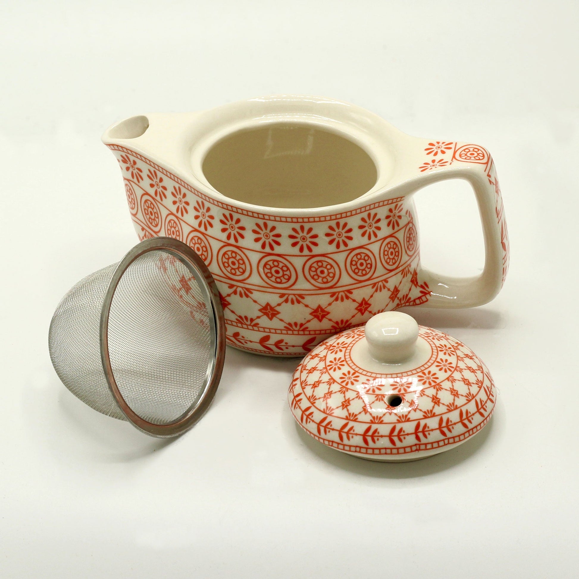 350ml Small Ceramic Amber Herbal Teapot and Strainer product packaging on clean background from Quintessential Holistic Health Ltd