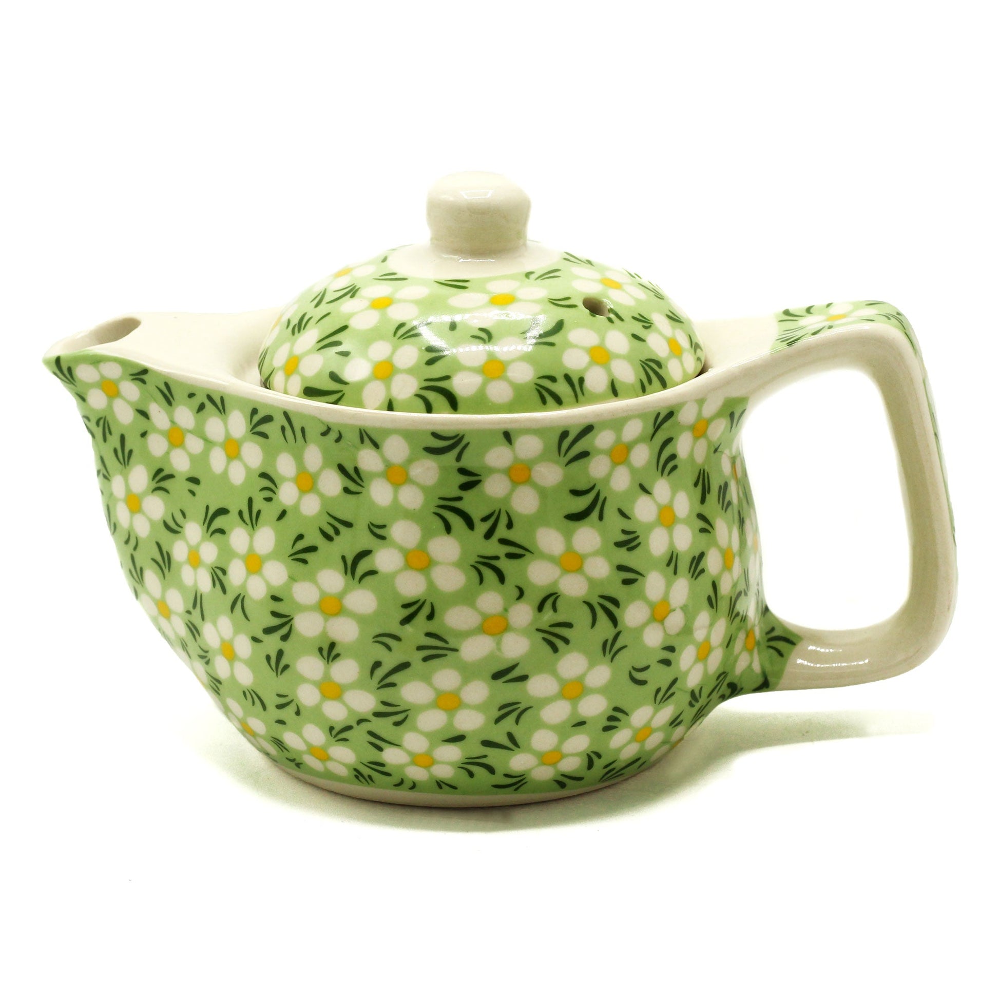 350ml Small Ceramic Green Daisy Design Herbal Teapot and Strainer product packaging on clean background from Quintessential Holistic Health Ltd