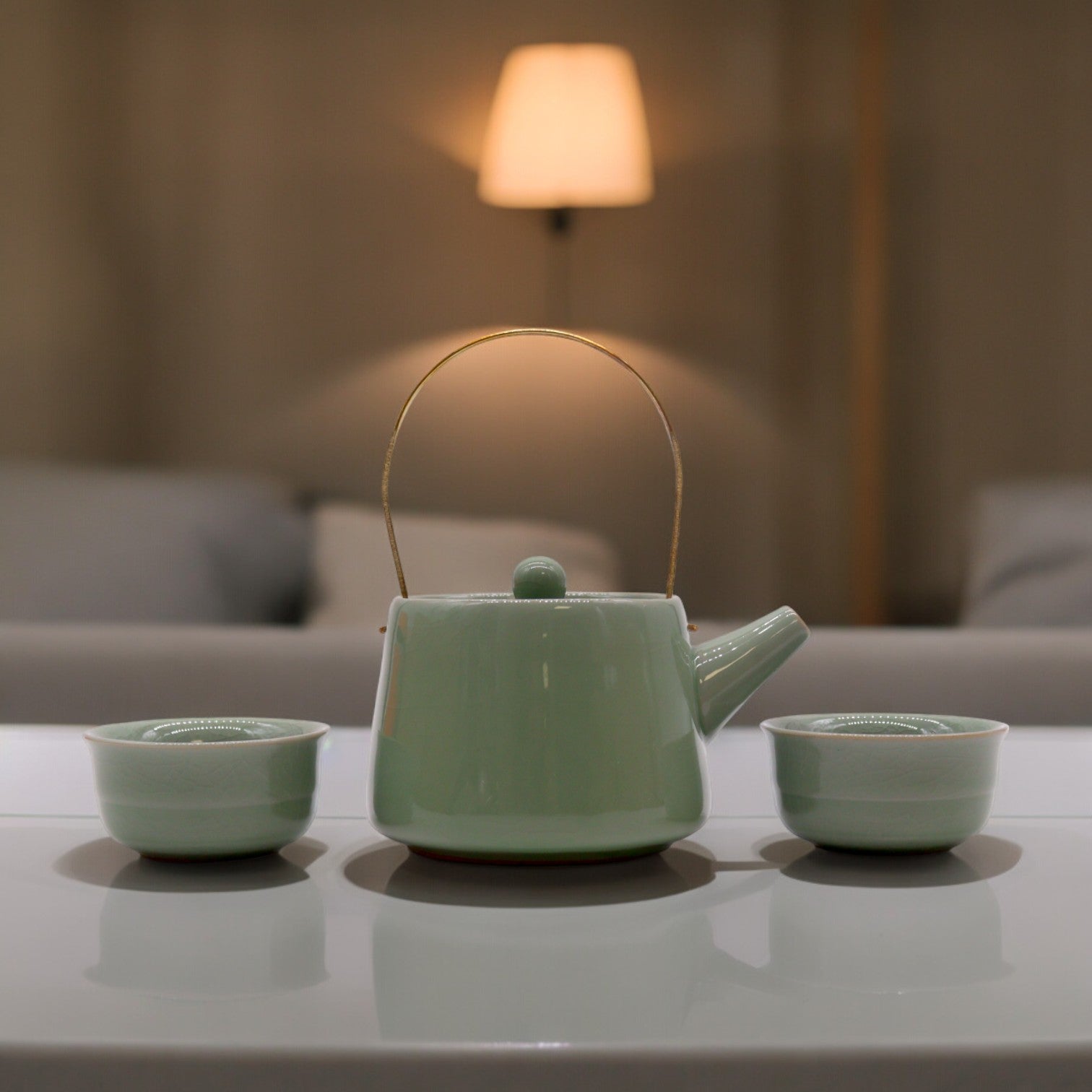 200ml Ceramic Jade Herbal Teapot with a 2 Matching Cups product packaging on clean background from Quintessential Holistic Health Ltd