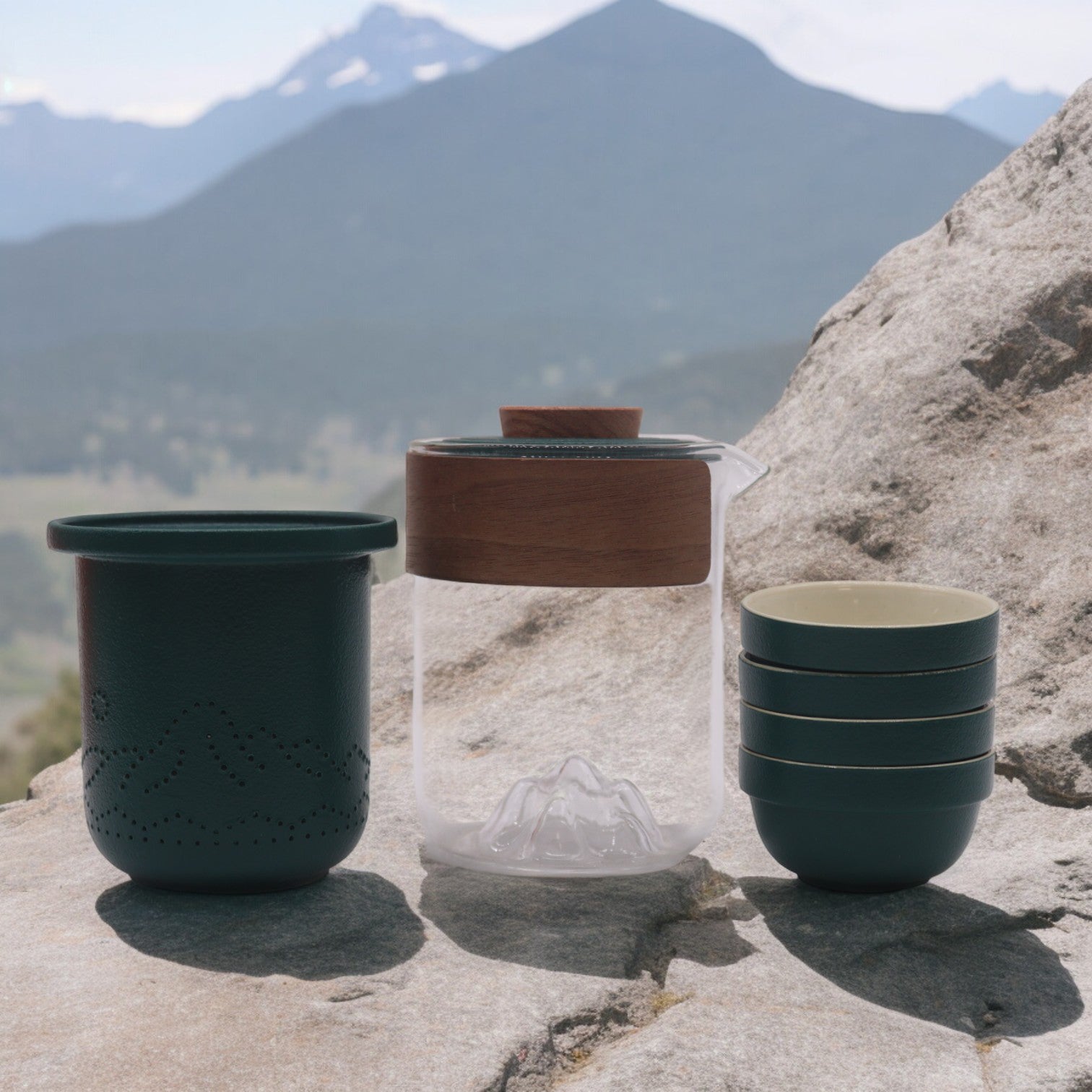 300ml Small Mountain Travel Ceramic Teapot with an Infuser a 4 Cup Set and a Travel Case product packaging on clean background from Quintessential Holistic Health Ltd