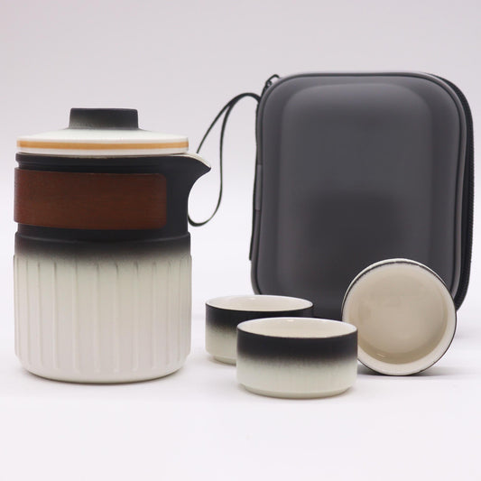 350ml Small Ceramic Teapot with an Infuser a 3 Matching Cup Set and Travel Case product packaging on clean background from Quintessential Holistic Health Ltd