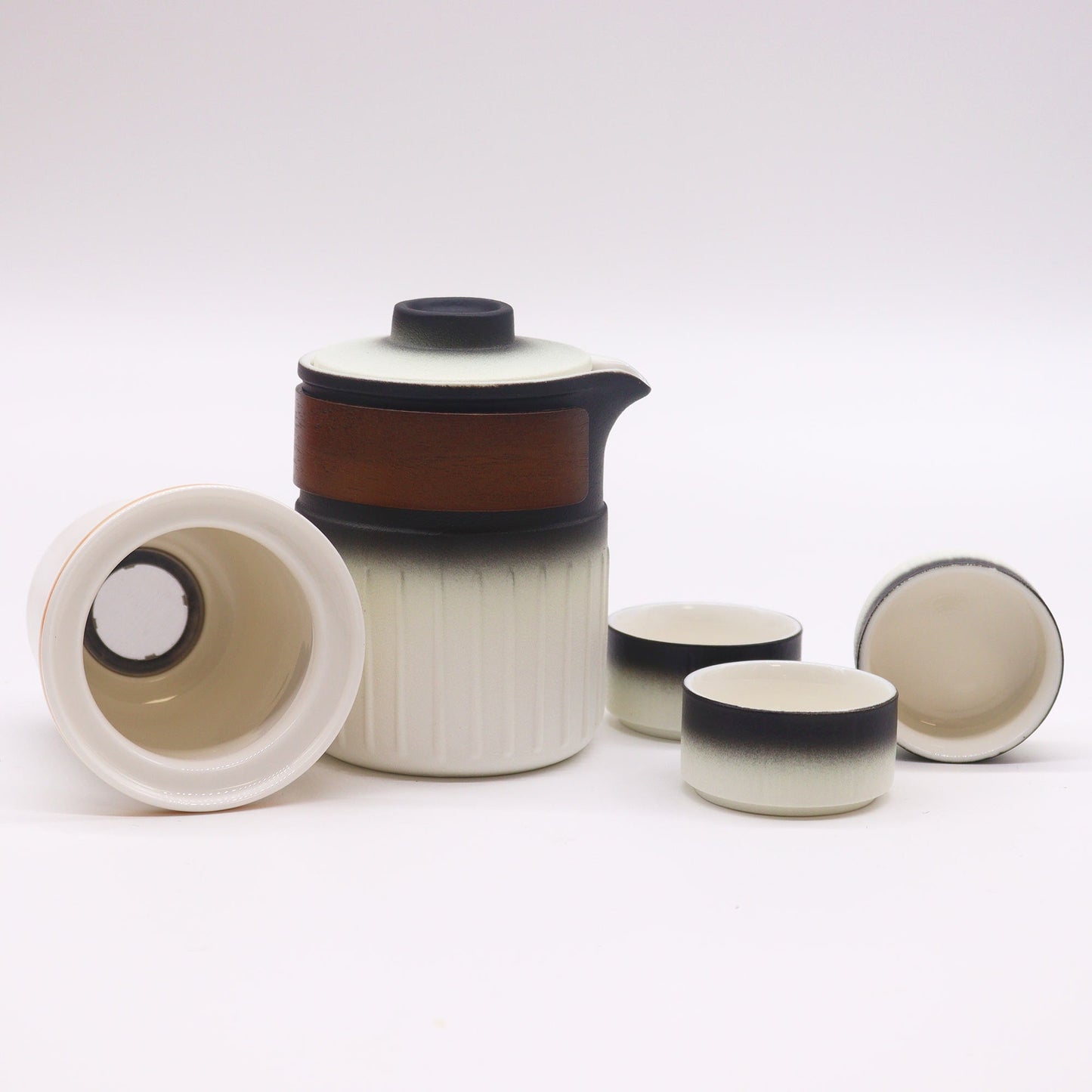 350ml Small Ceramic Teapot with an Infuser a 3 Matching Cup Set and Travel Case product packaging on clean background from Quintessential Holistic Health Ltd