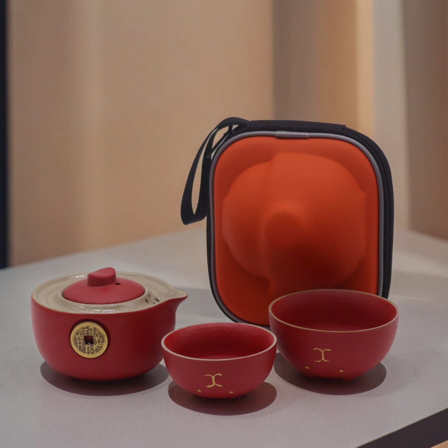 200ml Small Red Money Cat Ceramic Teapot with a 2 Matching Cup Set and Travel Case product packaging on clean background from Quintessential Holistic Health Ltd
