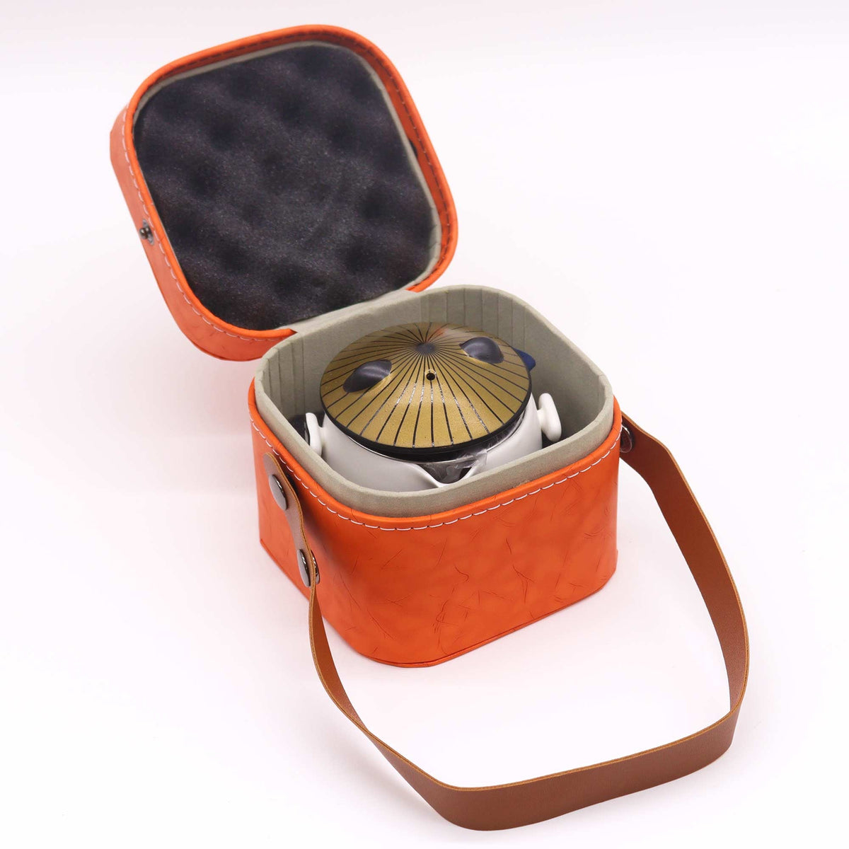 Kung Fu Panda Teapot Set - 2 Cups, Black/White, Orange Case, 210 ml nestled inside an open orange carrying case, by Quintessential Holistic Health Ltd