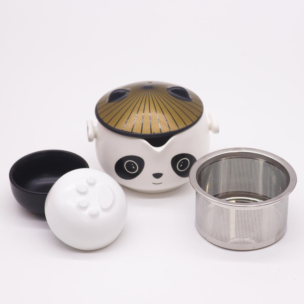 Kung Fu Panda Teapot Set - 2 Cups, Black/White, Orange Case, 210 ml displayed with black and white cups and a metal infuser, by Quintessential Holistic Health Ltd